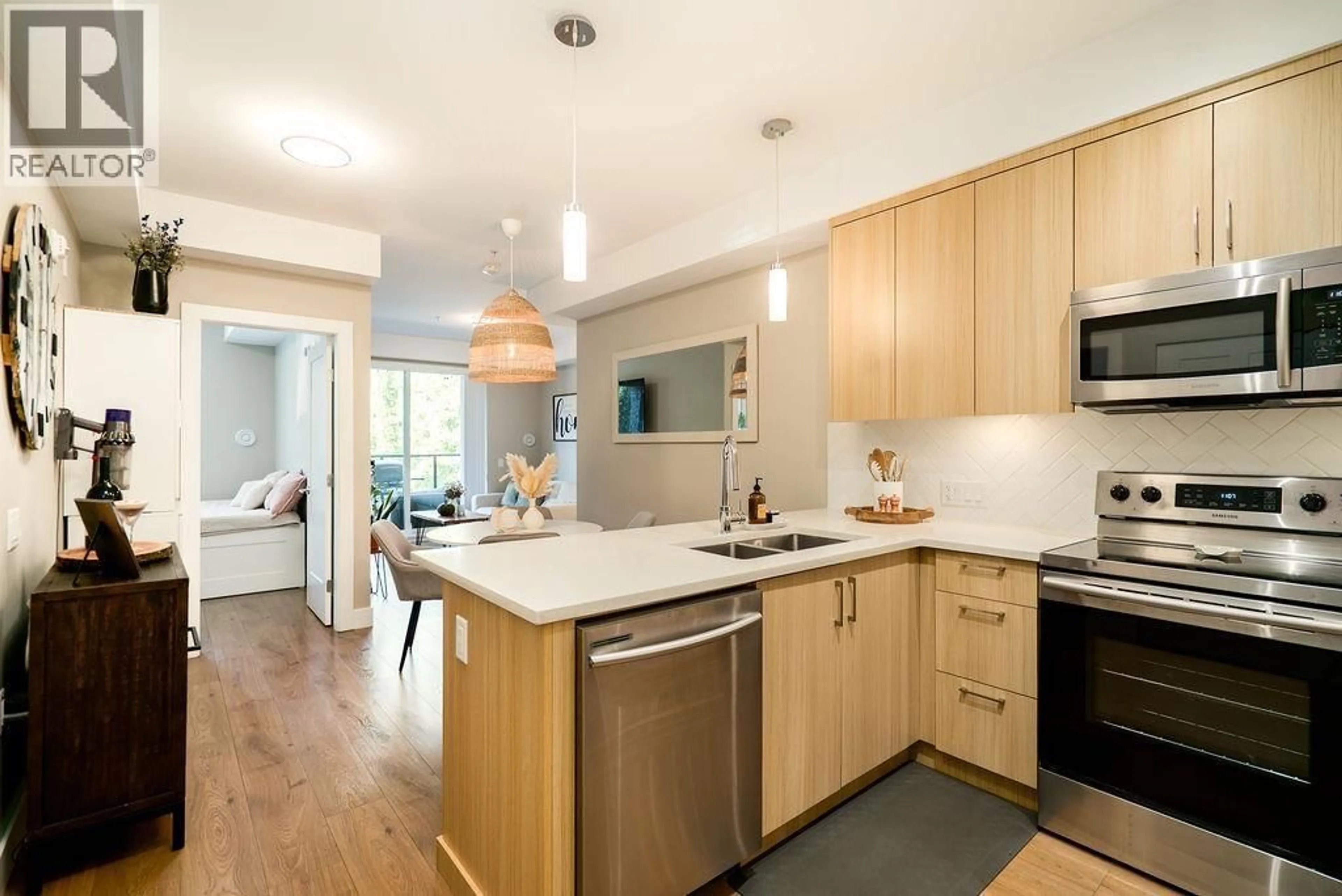 Open concept kitchen, wood/laminate floor for 222 - 12460 191 STREET, Pitt Meadows British Columbia V3Y2J2