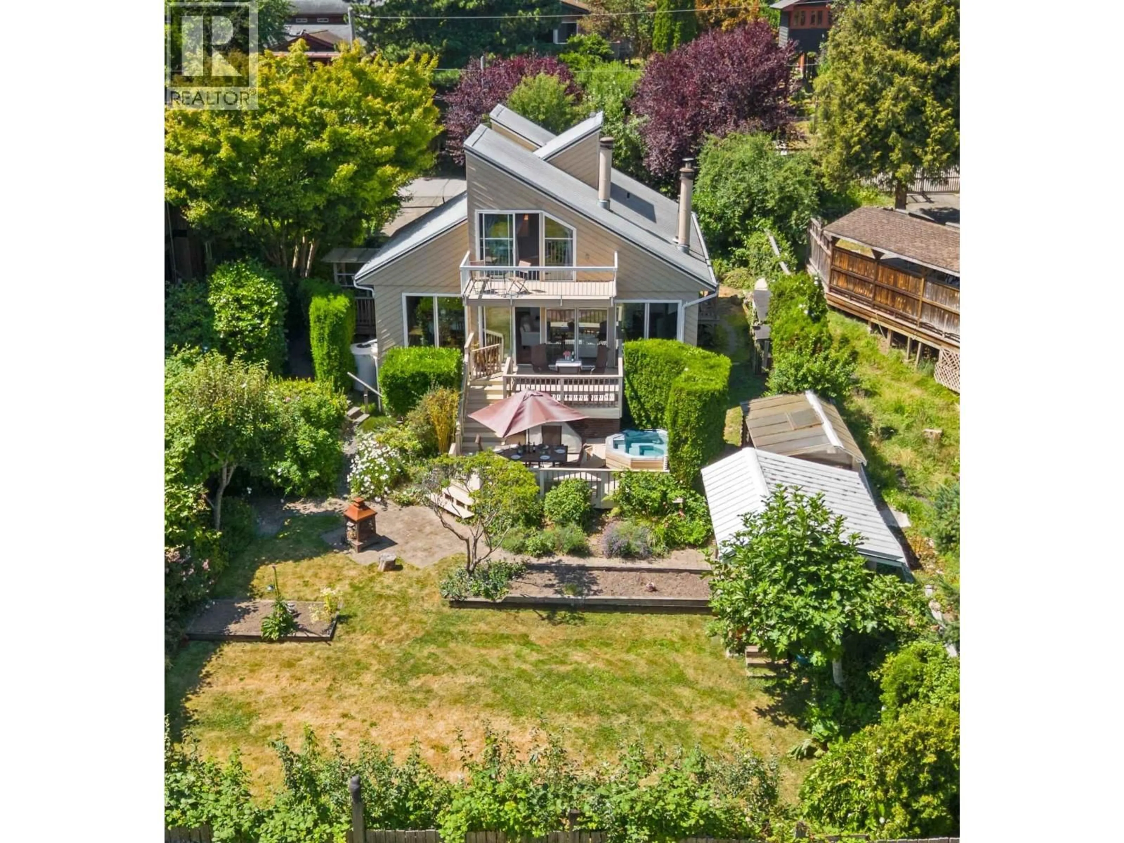 A pic from outside/outdoor area/front of a property/back of a property/a pic from drone, street for 1115 LENORA ROAD, Bowen Island British Columbia V0N1G1