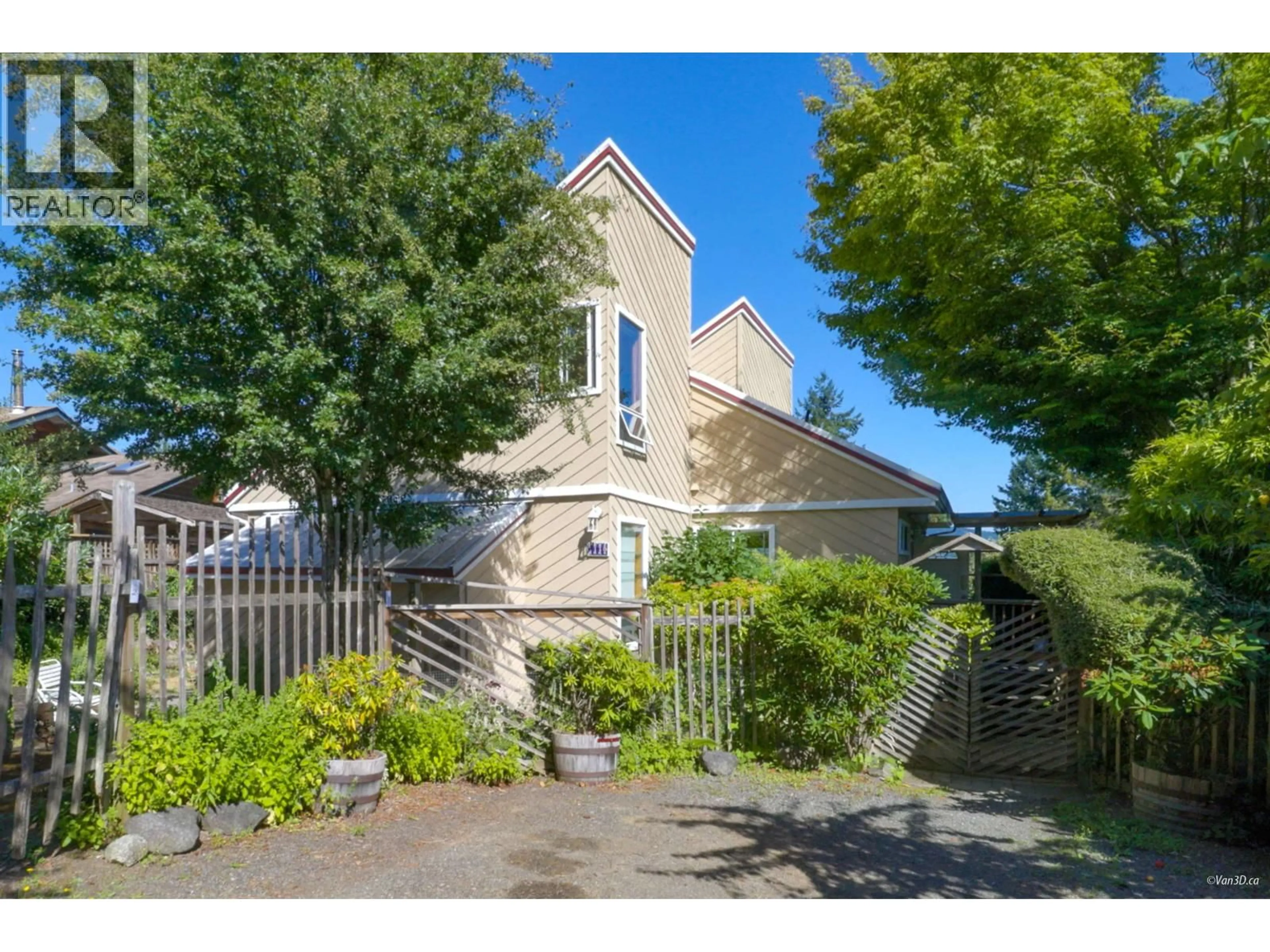 A pic from outside/outdoor area/front of a property/back of a property/a pic from drone, street for 1115 LENORA ROAD, Bowen Island British Columbia V0N1G1