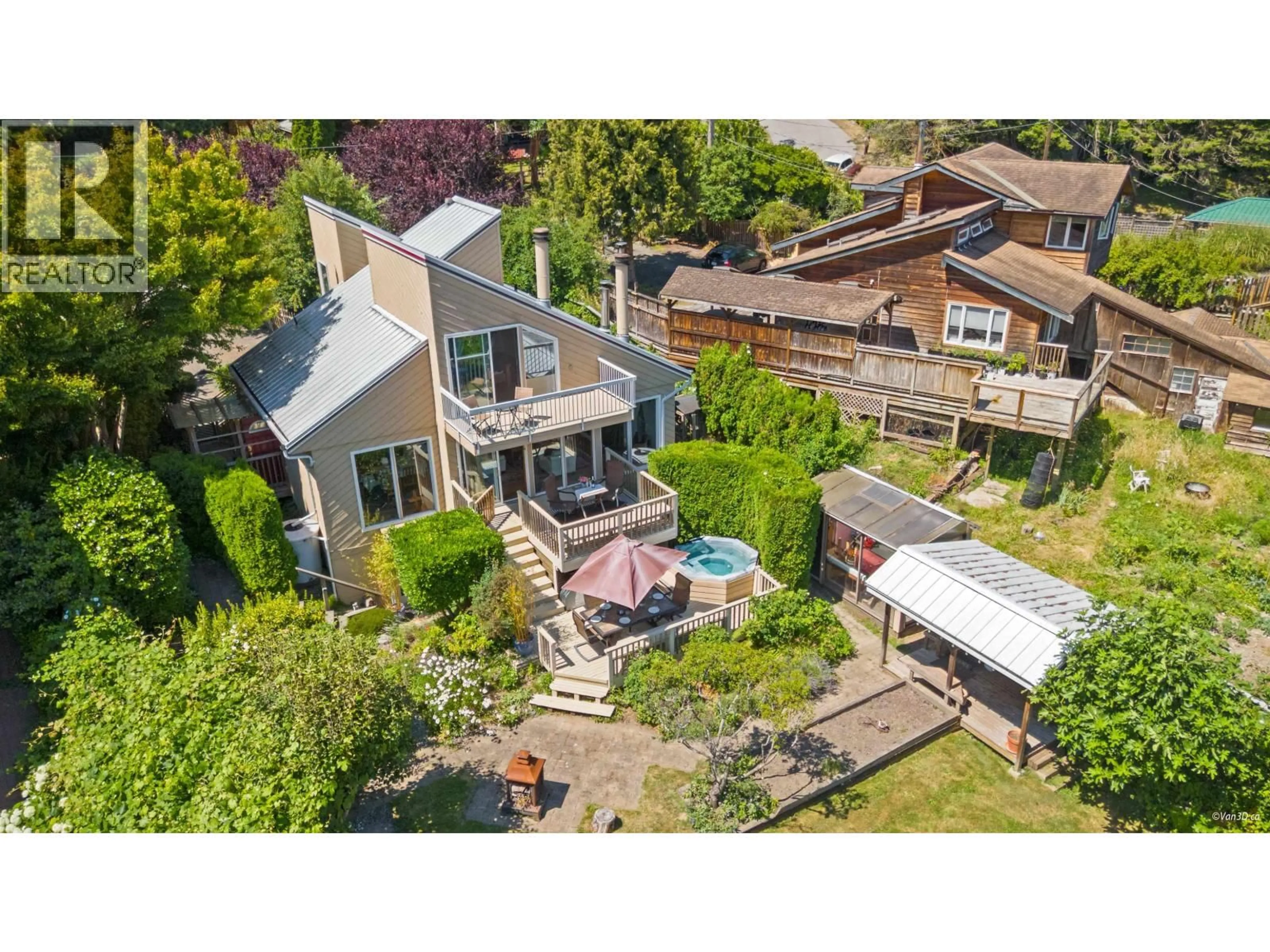 A pic from outside/outdoor area/front of a property/back of a property/a pic from drone, street for 1115 LENORA ROAD, Bowen Island British Columbia V0N1G1
