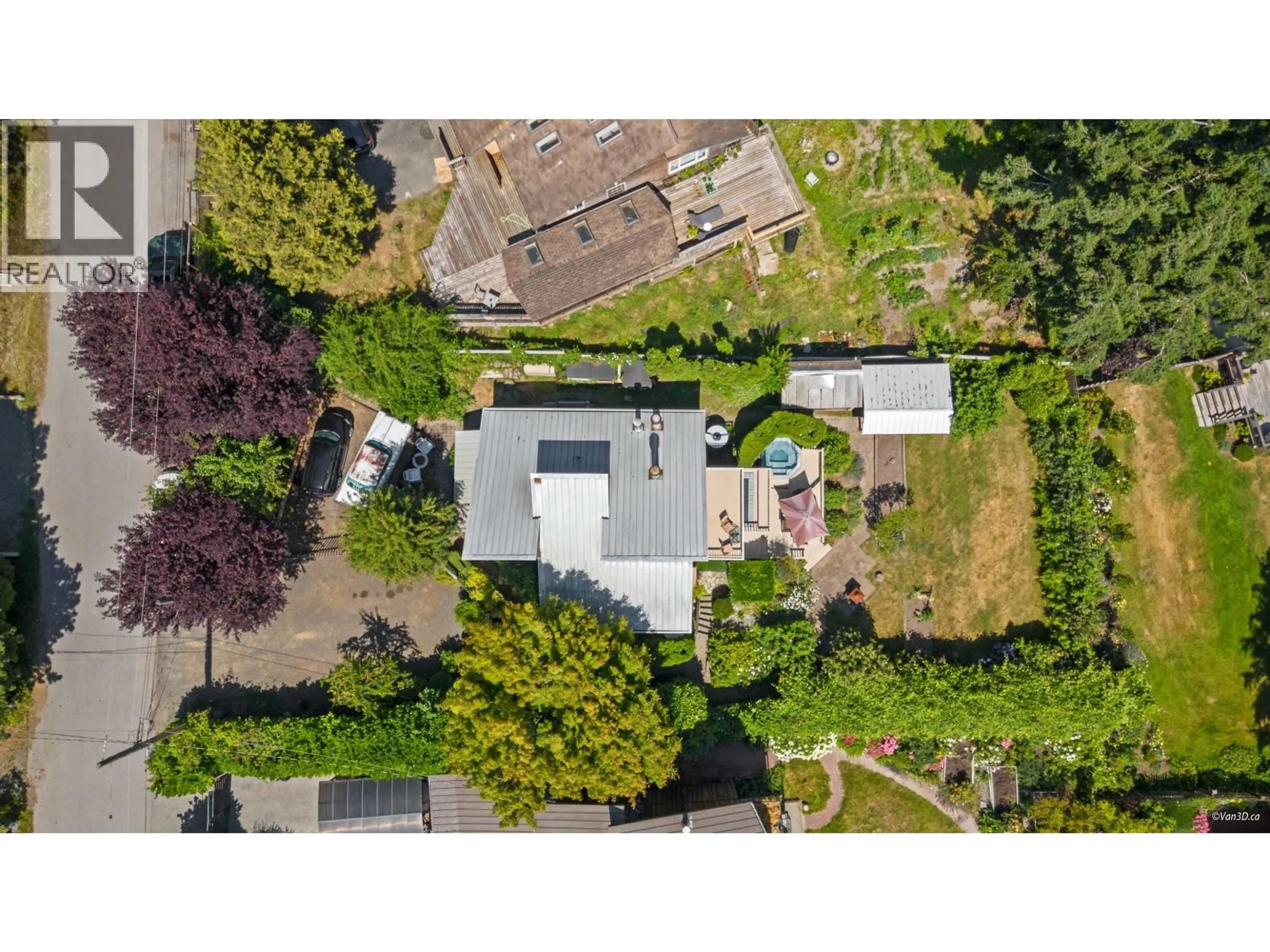 A pic from outside/outdoor area/front of a property/back of a property/a pic from drone, street for 1115 LENORA ROAD, Bowen Island British Columbia V0N1G1