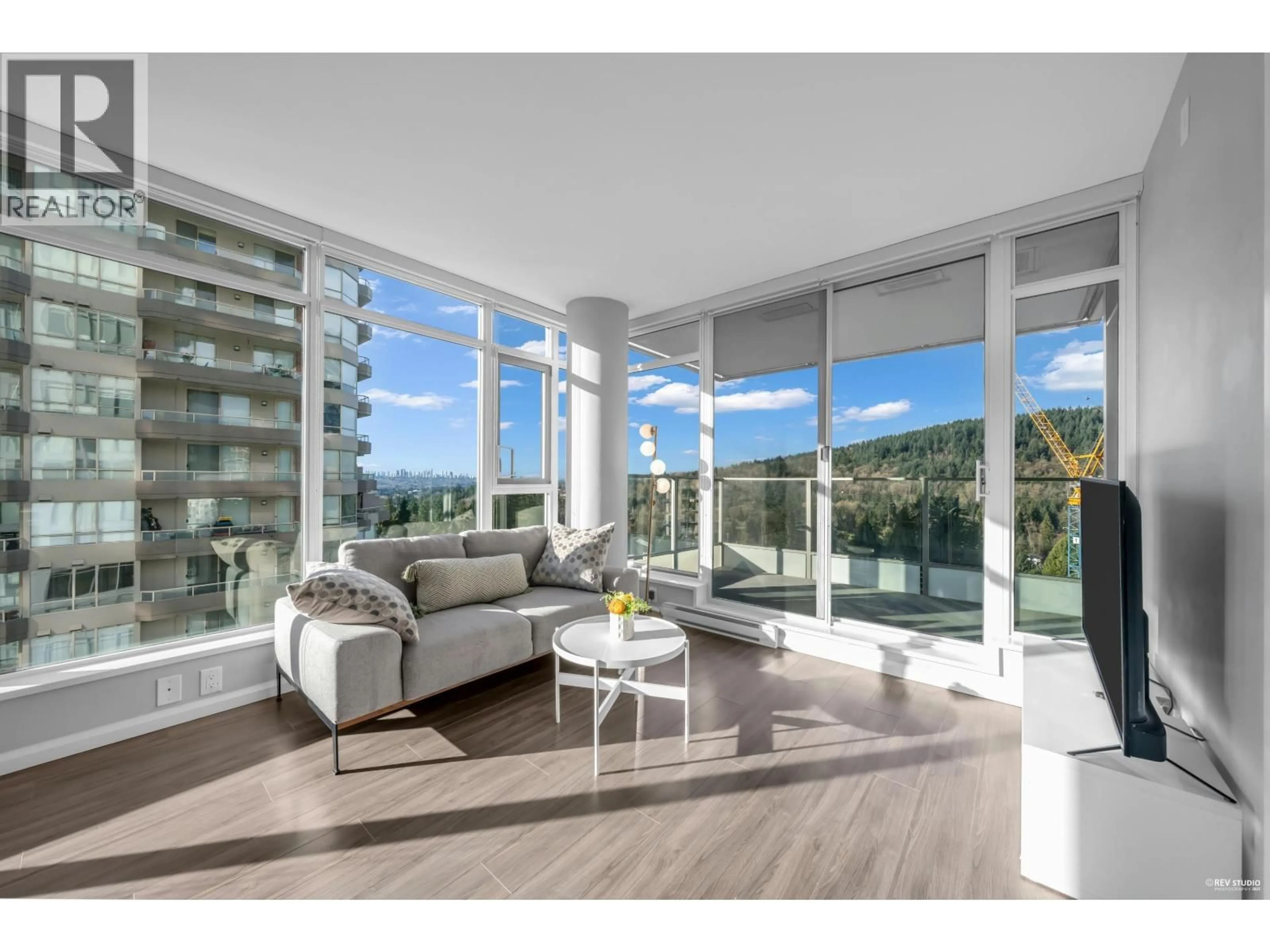 Living room with furniture, unknown for 1102 - 520 COMO LAKE AVENUE, Coquitlam British Columbia V3J0E8