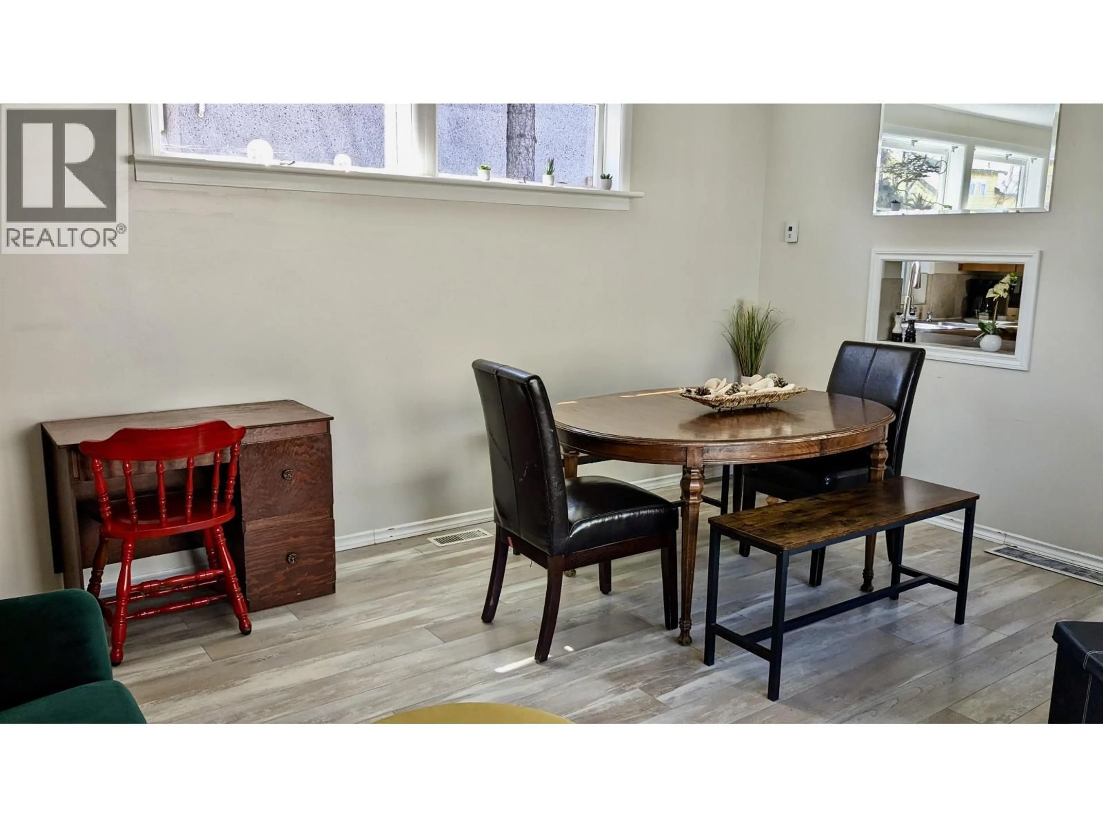 Dining room, wood/laminate floor for 1909 MAPLE STREET, Prince George British Columbia V2L1X2