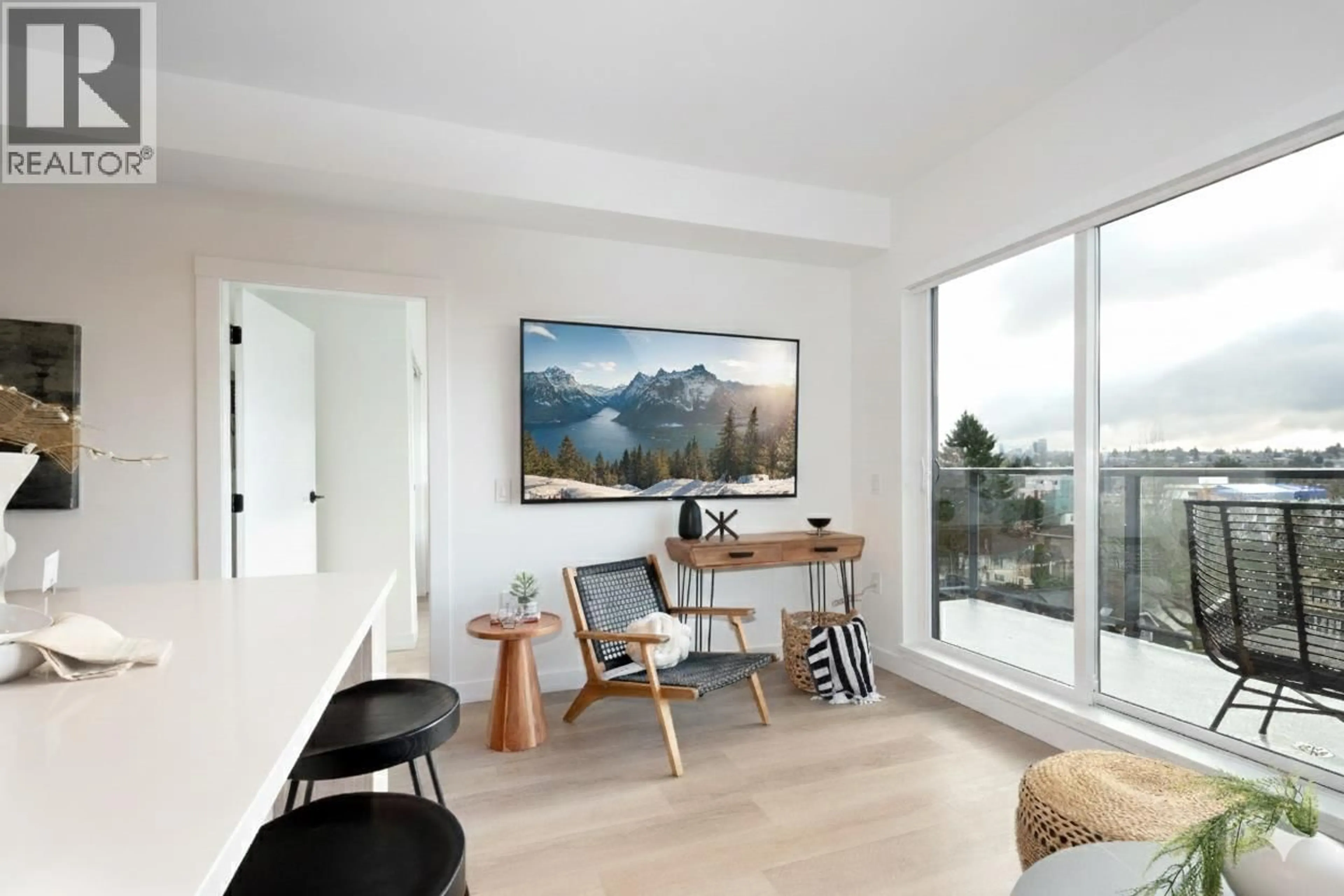Living room with furniture, wood/laminate floor for 606 - 2268 BROADWAY, Vancouver British Columbia V5N1W9