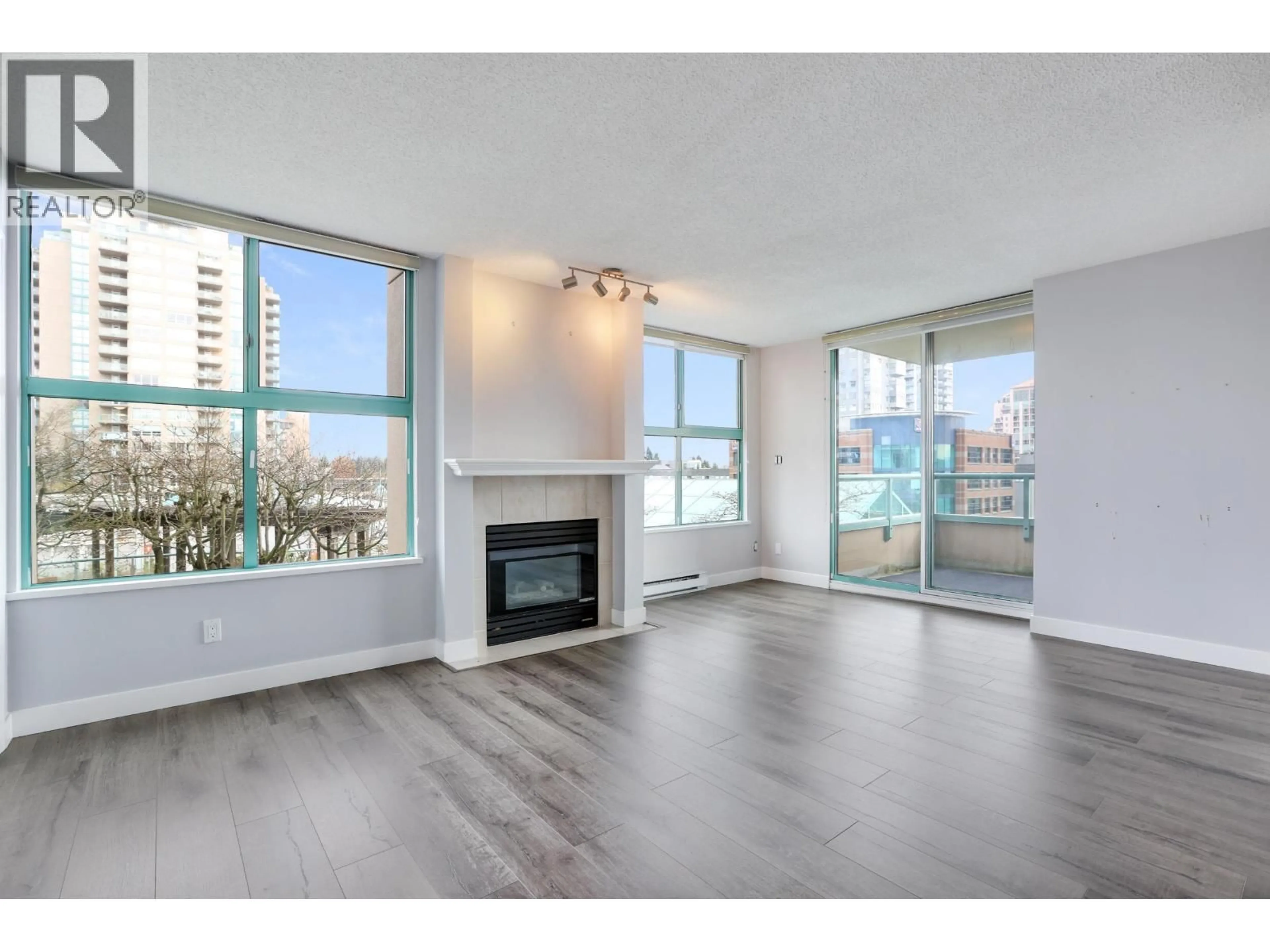 Living room with furniture, wood/laminate floor for 605 - 728 PRINCESS STREET, New Westminster British Columbia V3M6S4