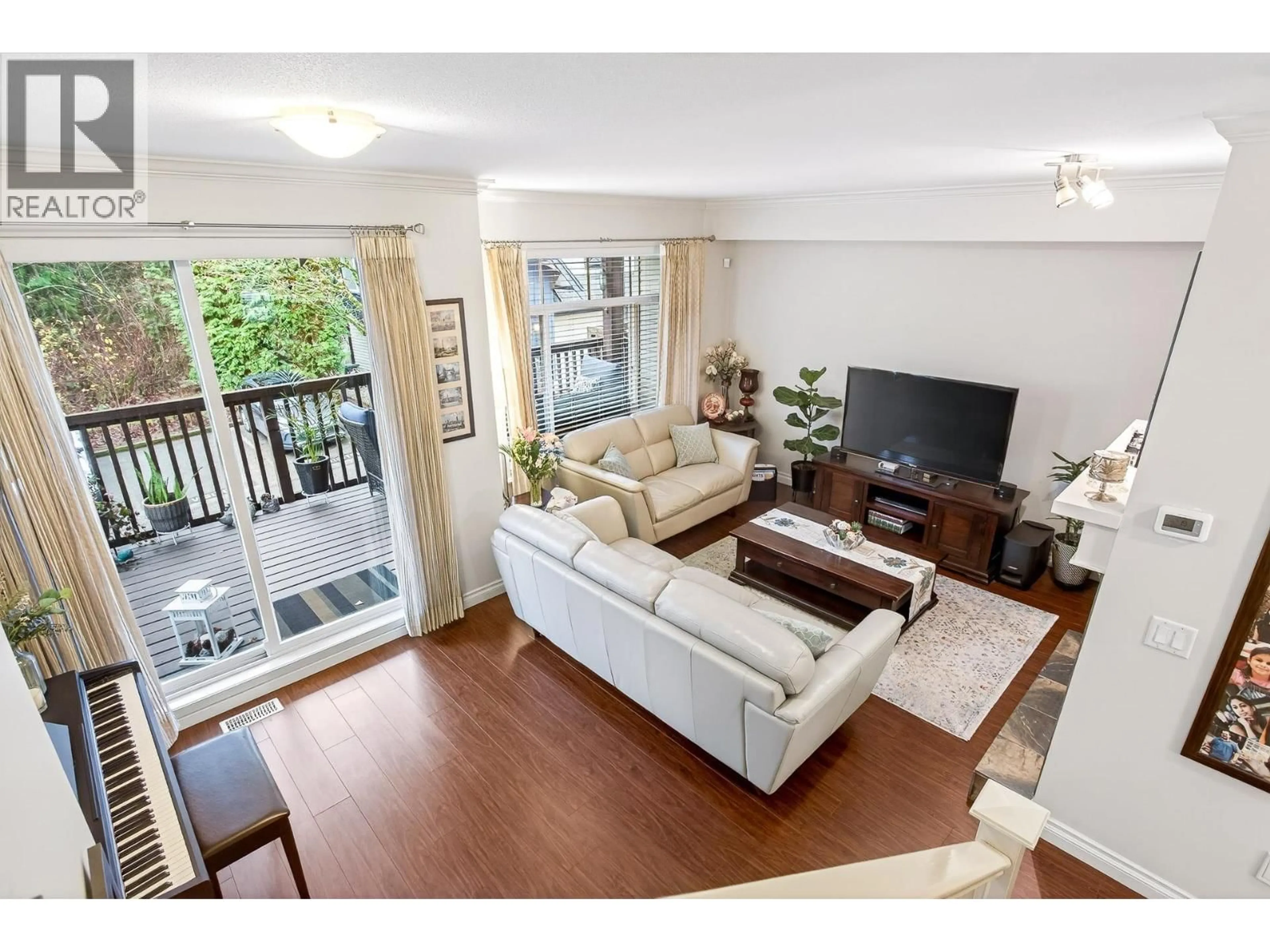 Living room with furniture, wood/laminate floor for 39 - 50 PANORAMA PLACE, Port Moody British Columbia V3H5H5