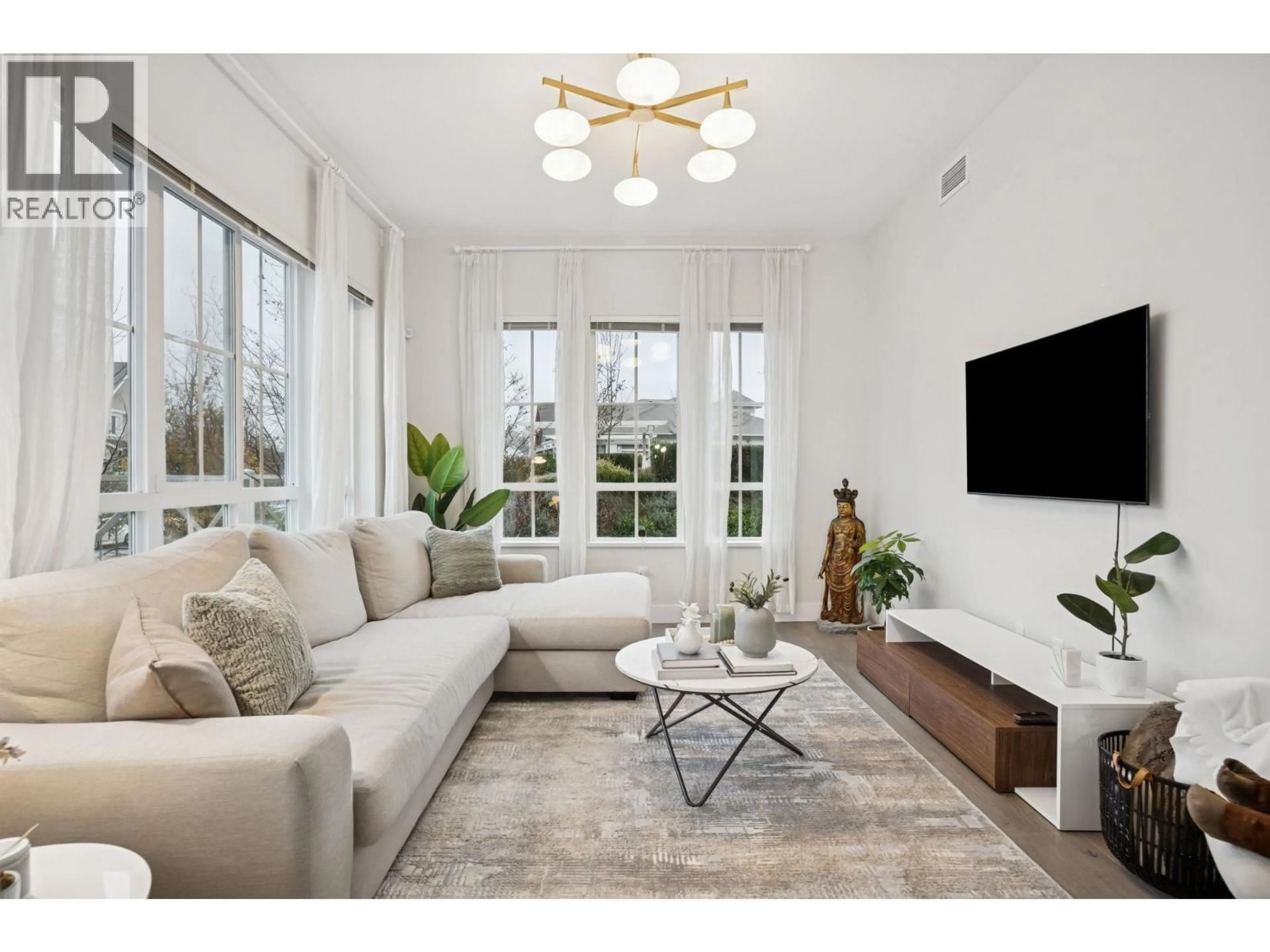 Living room with furniture, unknown for 103 - 5535 ADMIRAL WAY, Delta British Columbia V4K0E3