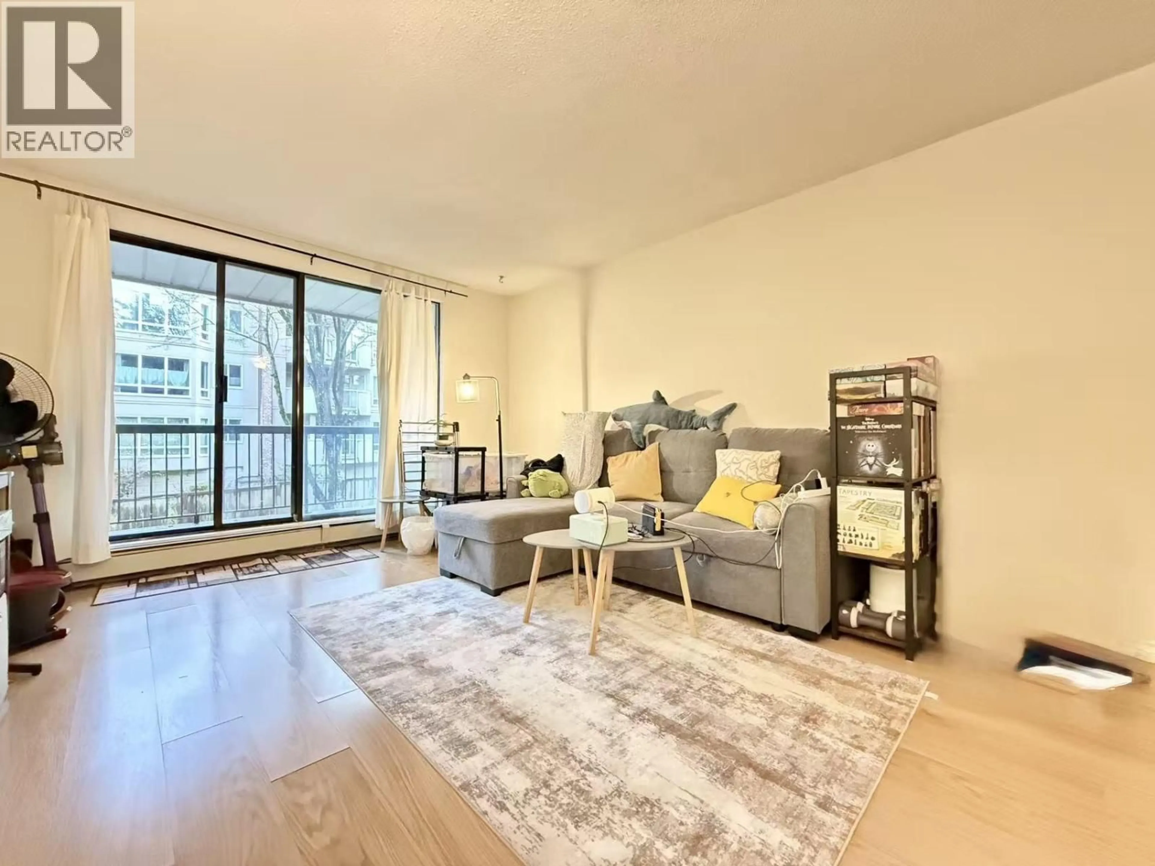 Living room with furniture, unknown for 105 - 8511 ACKROYD ROAD, Richmond British Columbia V6X3E7