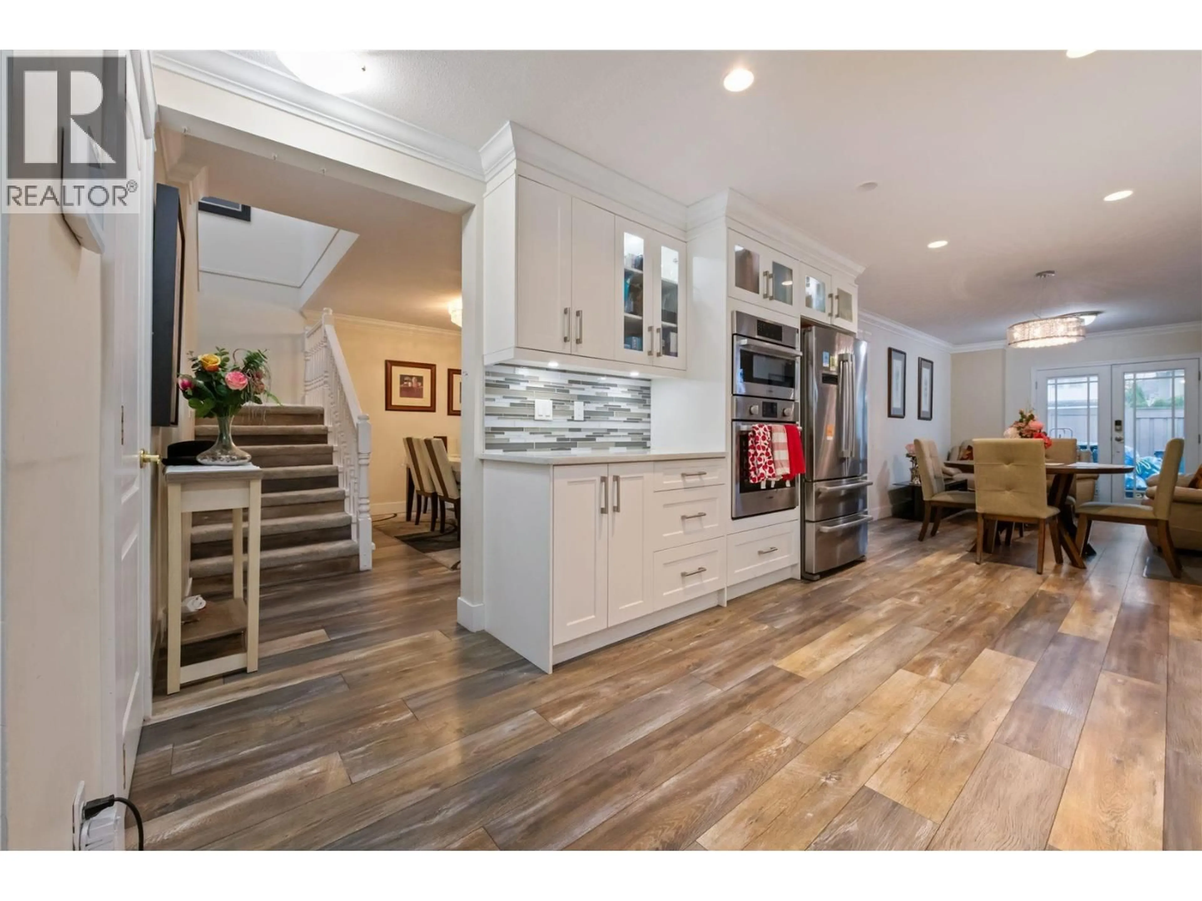 Open concept kitchen, wood/laminate floor for 13 - 4767 64 STREET, Delta British Columbia V4K3M2