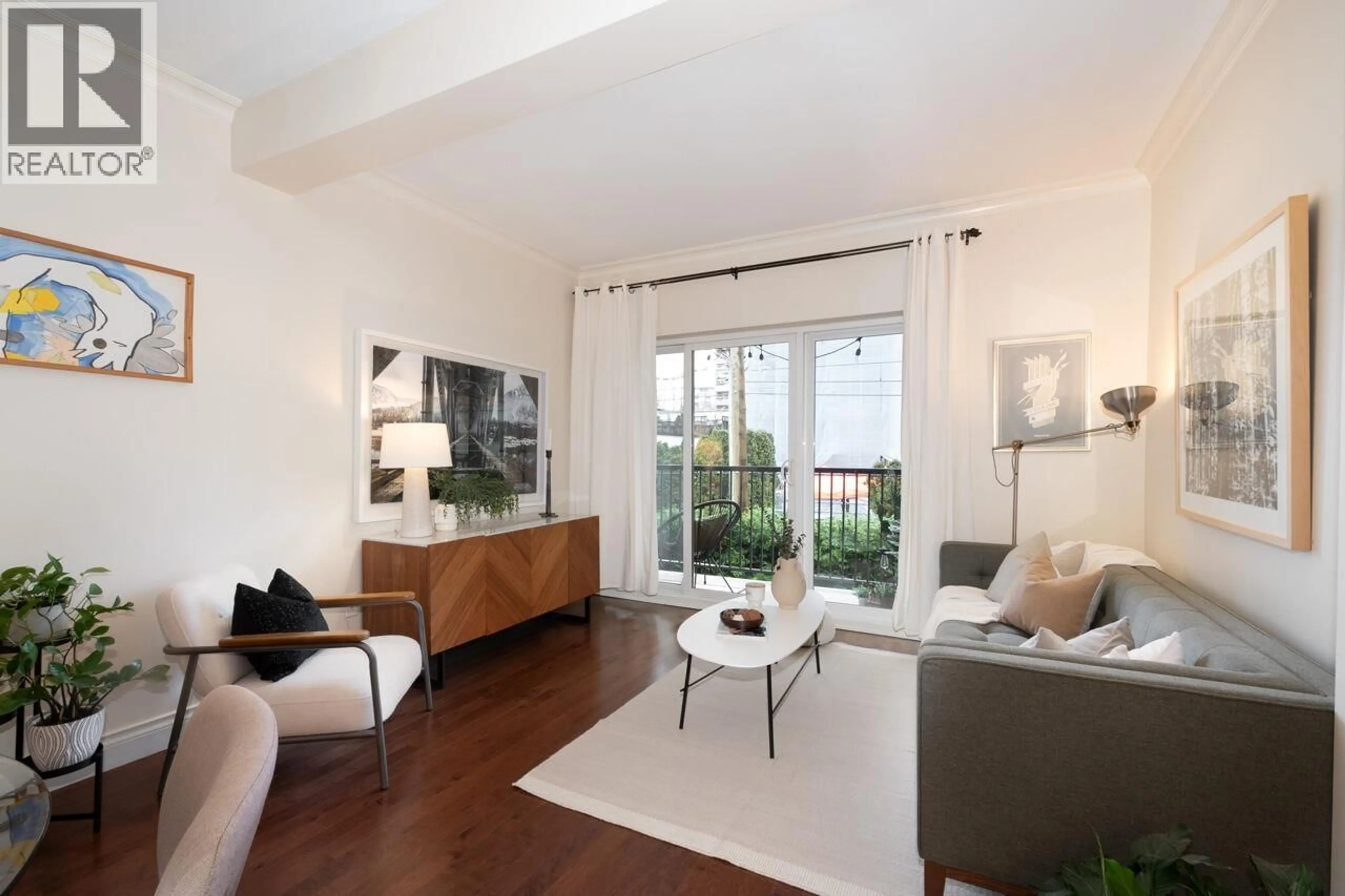 Living room with furniture, wood/laminate floor for 308 - 1655 NELSON STREET, Vancouver British Columbia V6G1M4