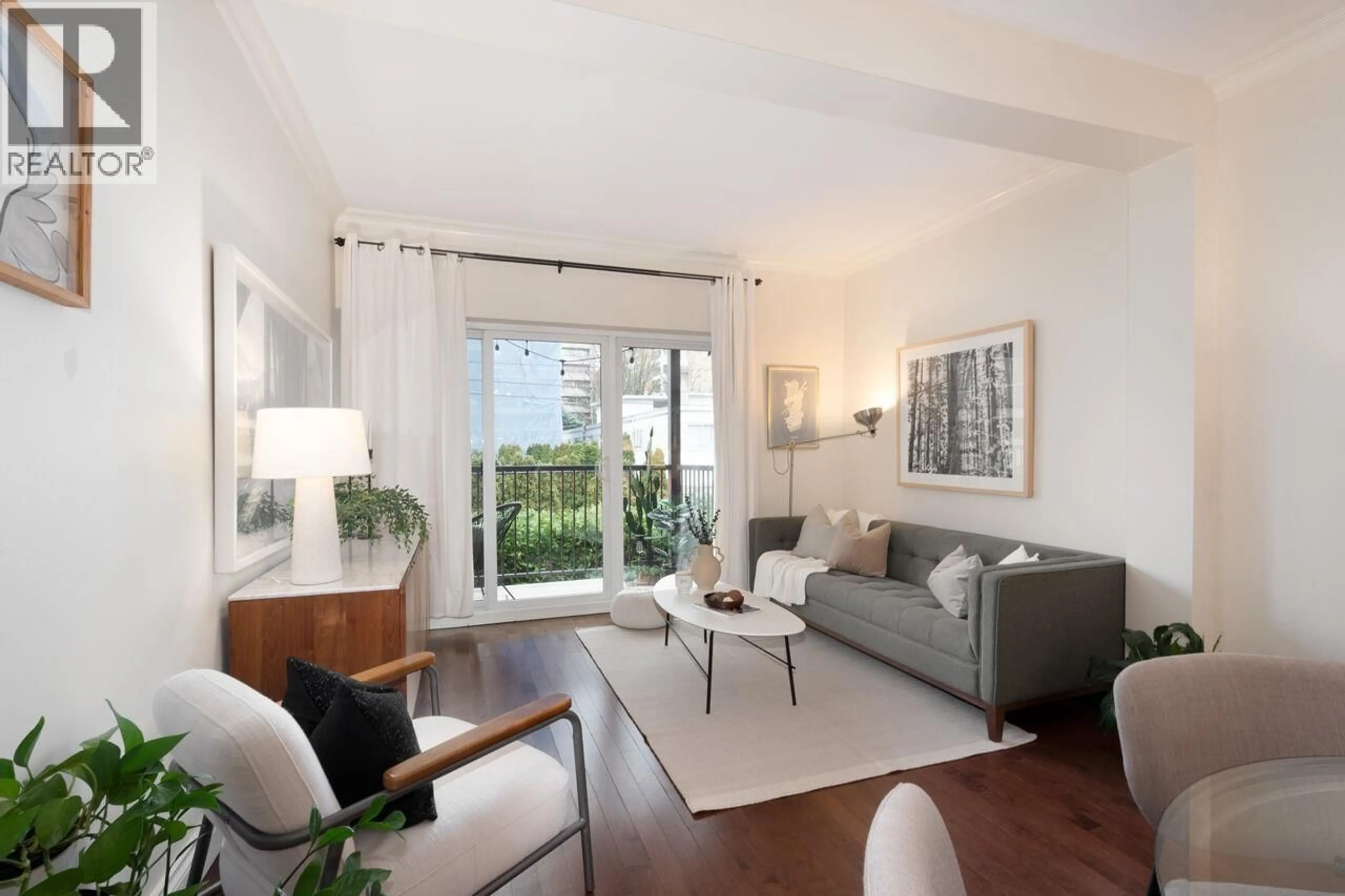 Living room with furniture, wood/laminate floor for 308 - 1655 NELSON STREET, Vancouver British Columbia V6G1M4