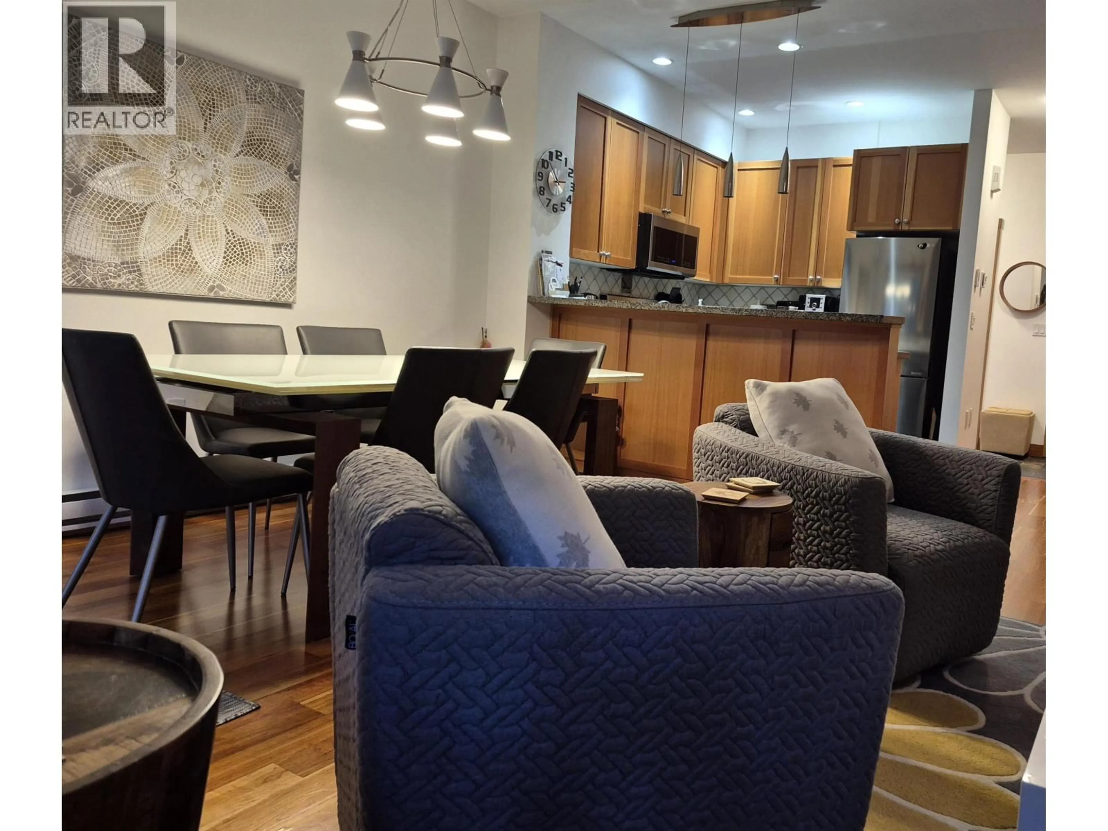 Living room with furniture, wood/laminate floor for 17 - 1530 TYNEBRIDGE LANE, Whistler British Columbia V8E0L3