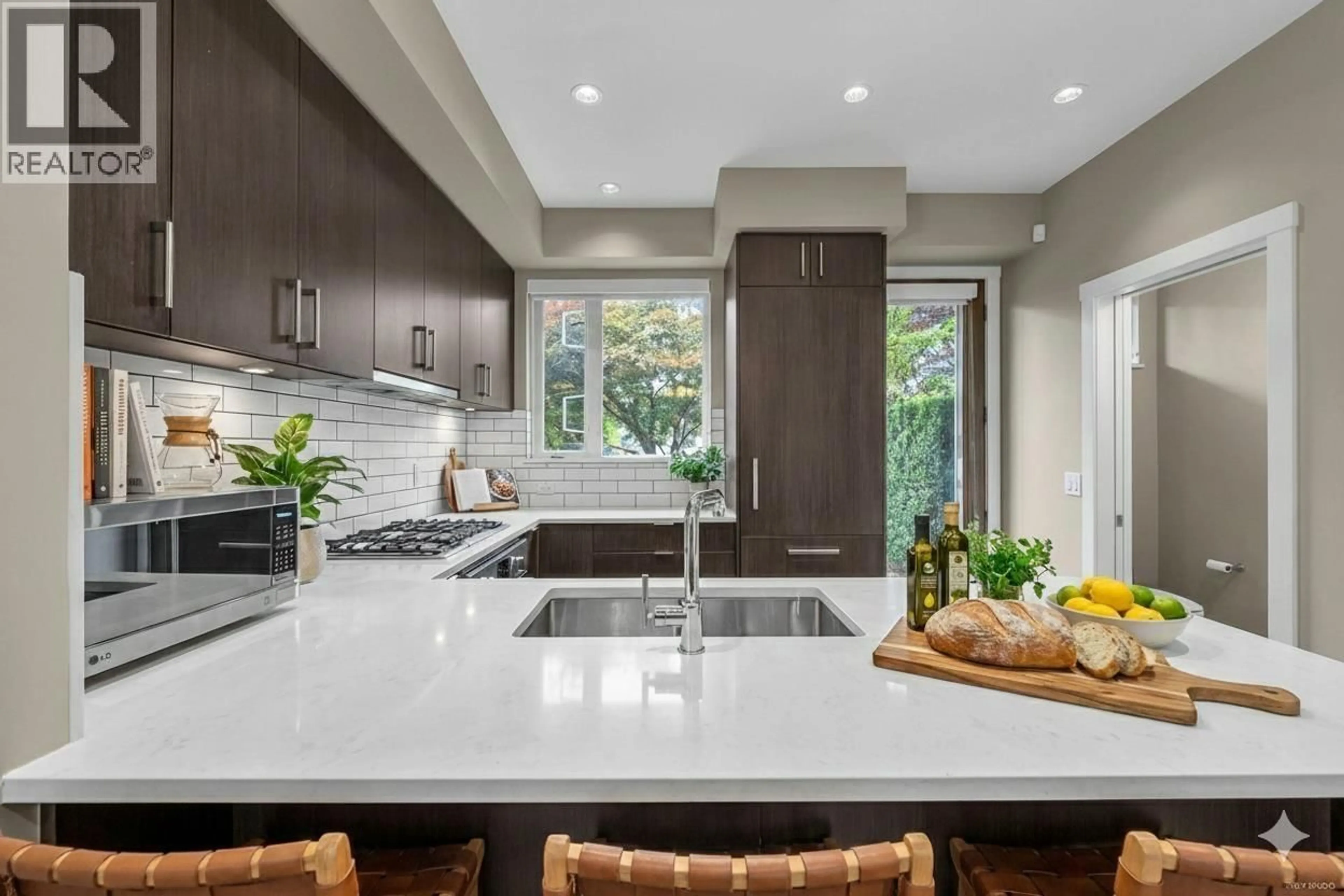 Contemporary kitchen, ceramic/tile floor for 5502 OAK STREET, Vancouver British Columbia V6M2V6