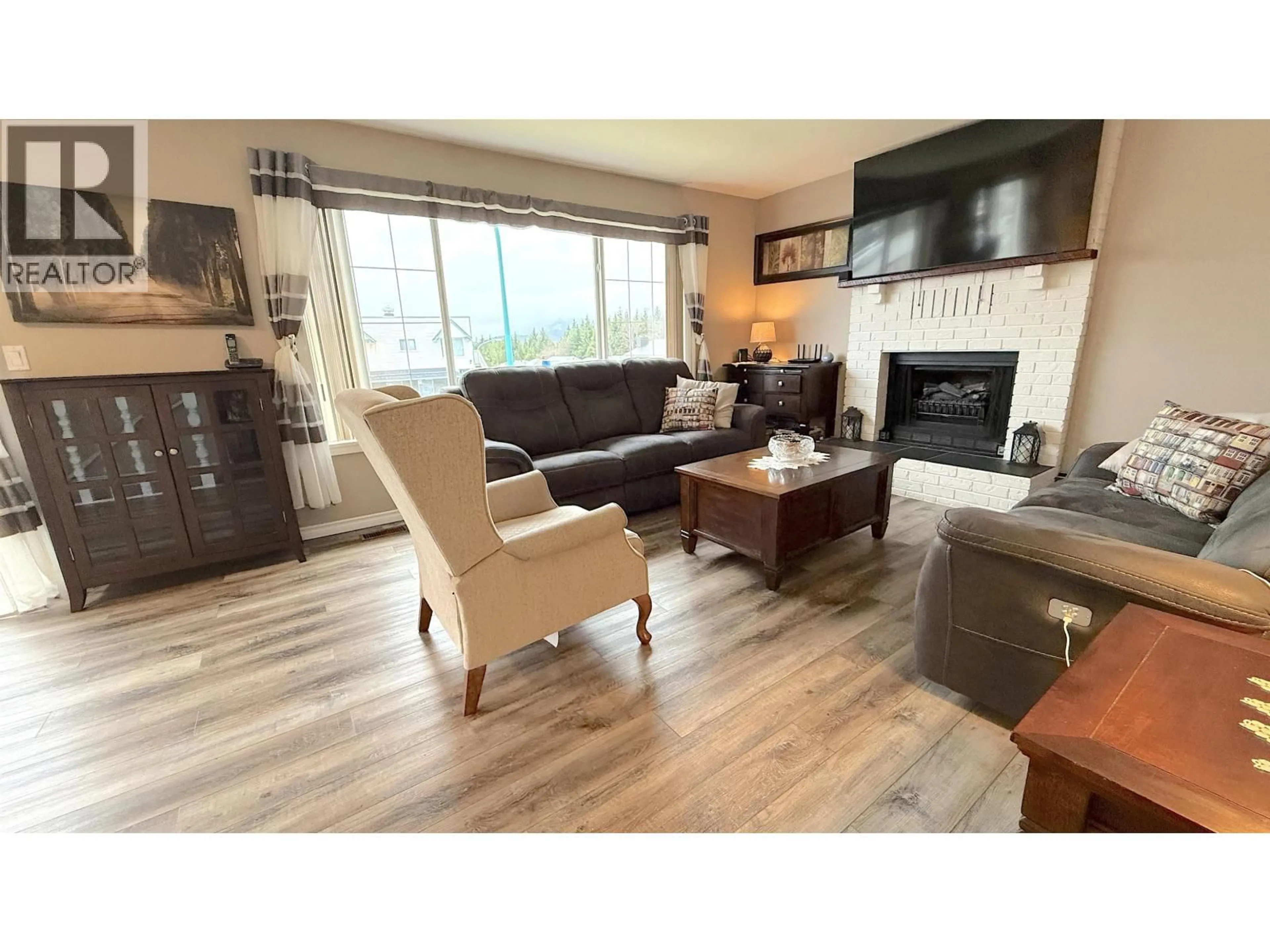 Living room with furniture, wood/laminate floor for 266 PRINCE RUPERT BOULEVARD, Prince Rupert British Columbia V8J4E2