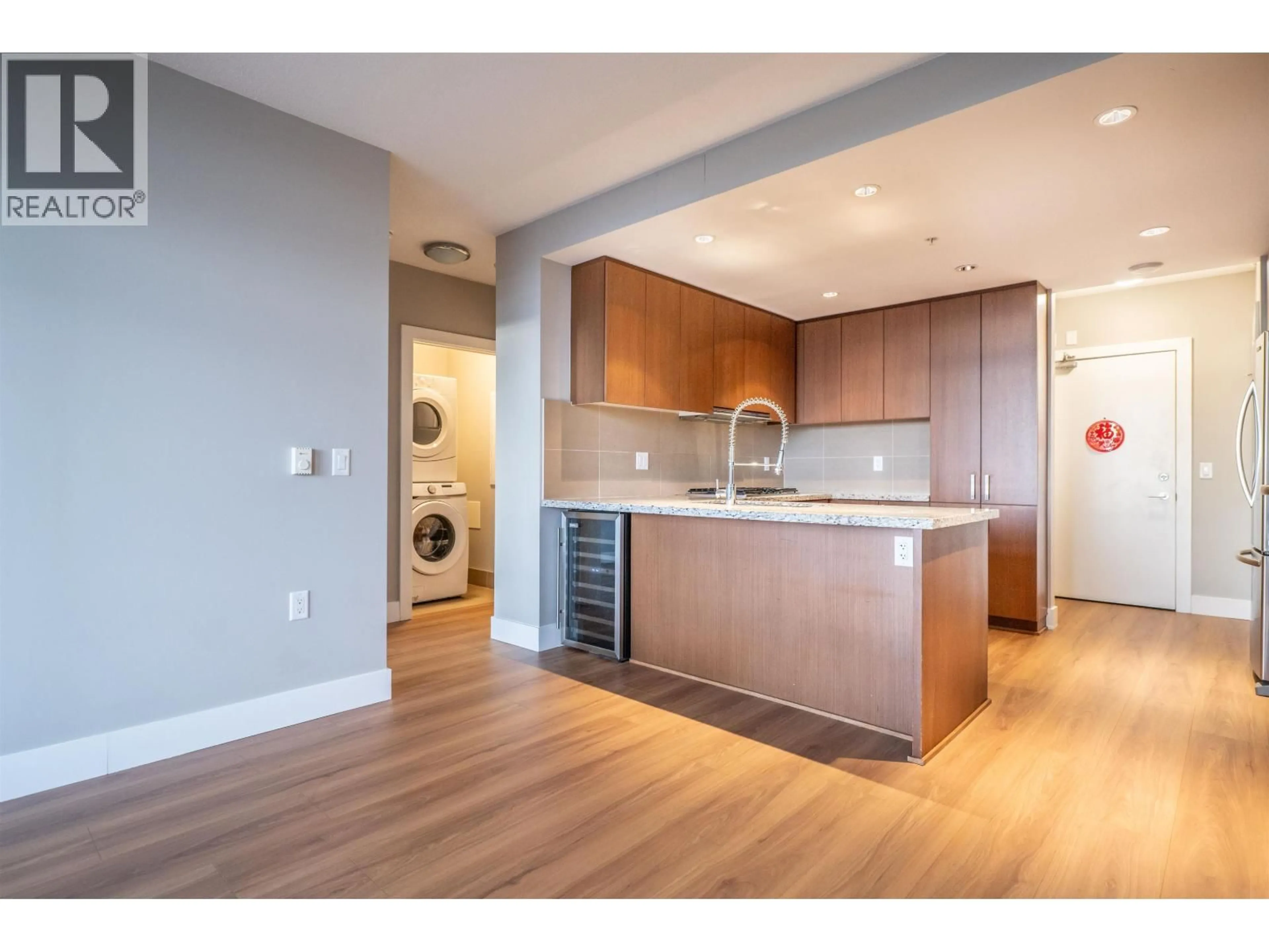 Open concept kitchen, wood/laminate floor for 1209 - 1155 THE HIGH STREET, Coquitlam British Columbia V3B7W4