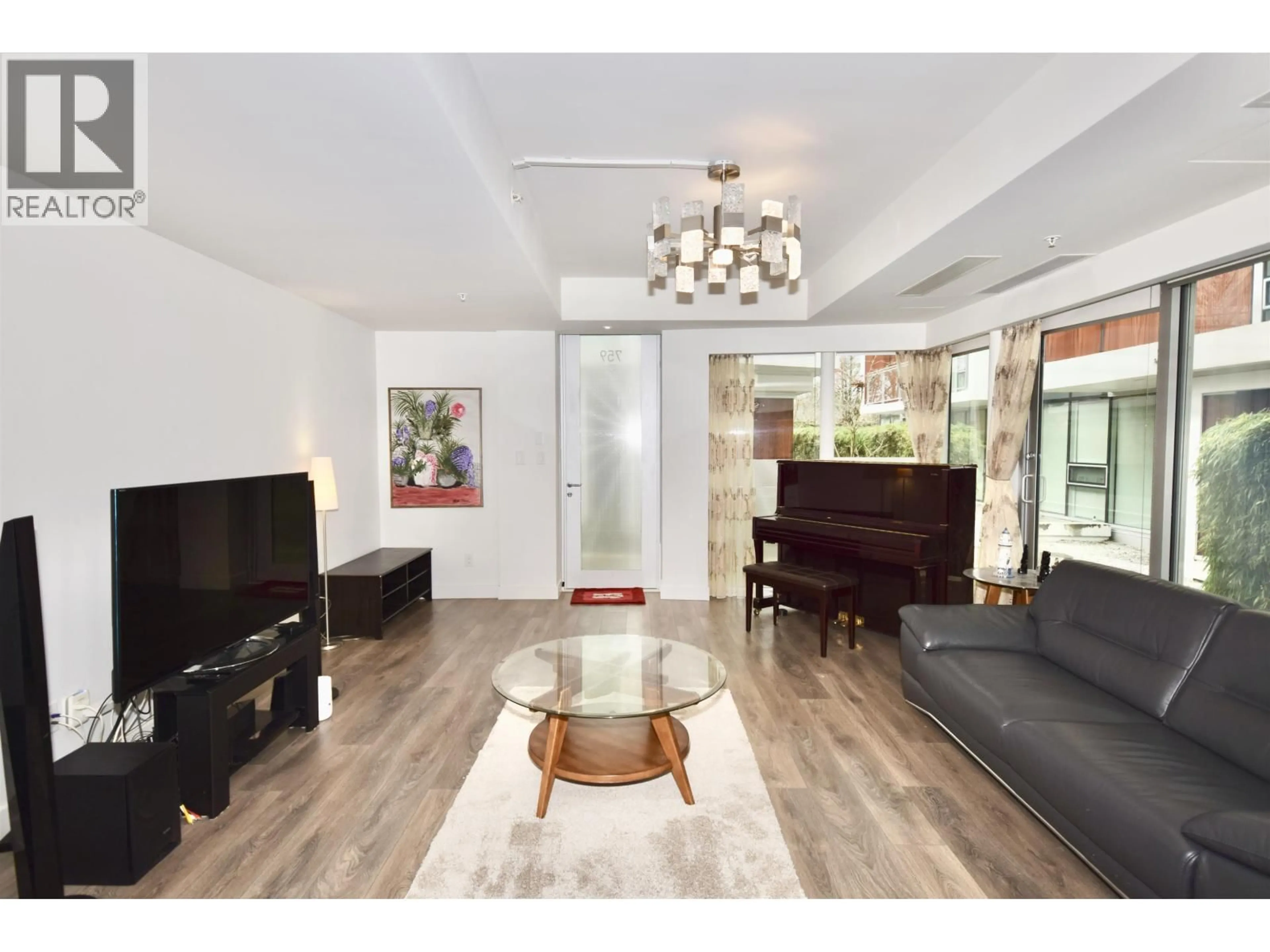 Living room with furniture, wood/laminate floor for 759 41ST AVENUE, Vancouver British Columbia V5Z3M7