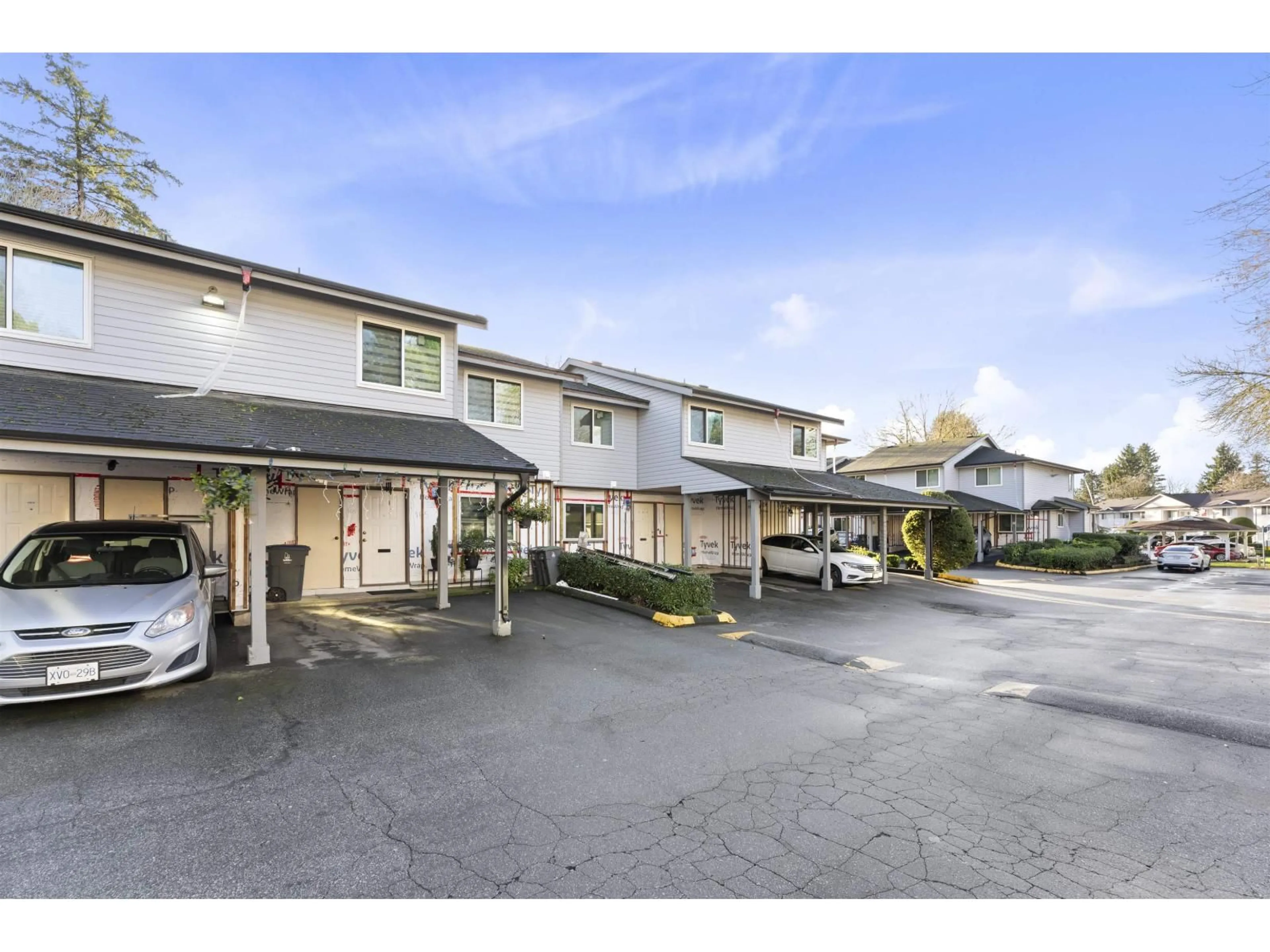 A pic from outside/outdoor area/front of a property/back of a property/a pic from drone, street for 164 - 7261 140 STREET, Surrey British Columbia V3W5J6