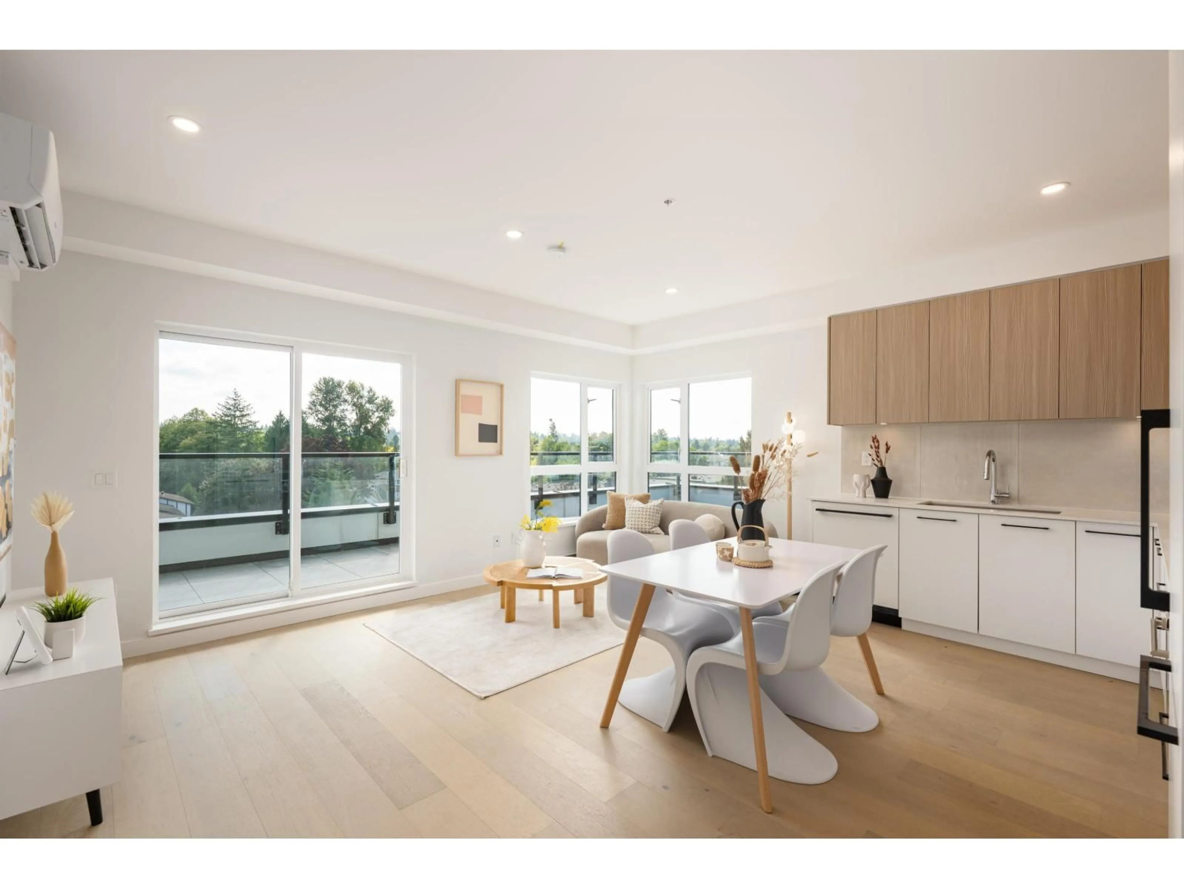 Open concept kitchen, wood/laminate floor for 502 - 5398 207 STREET, Langley British Columbia V3A2E6