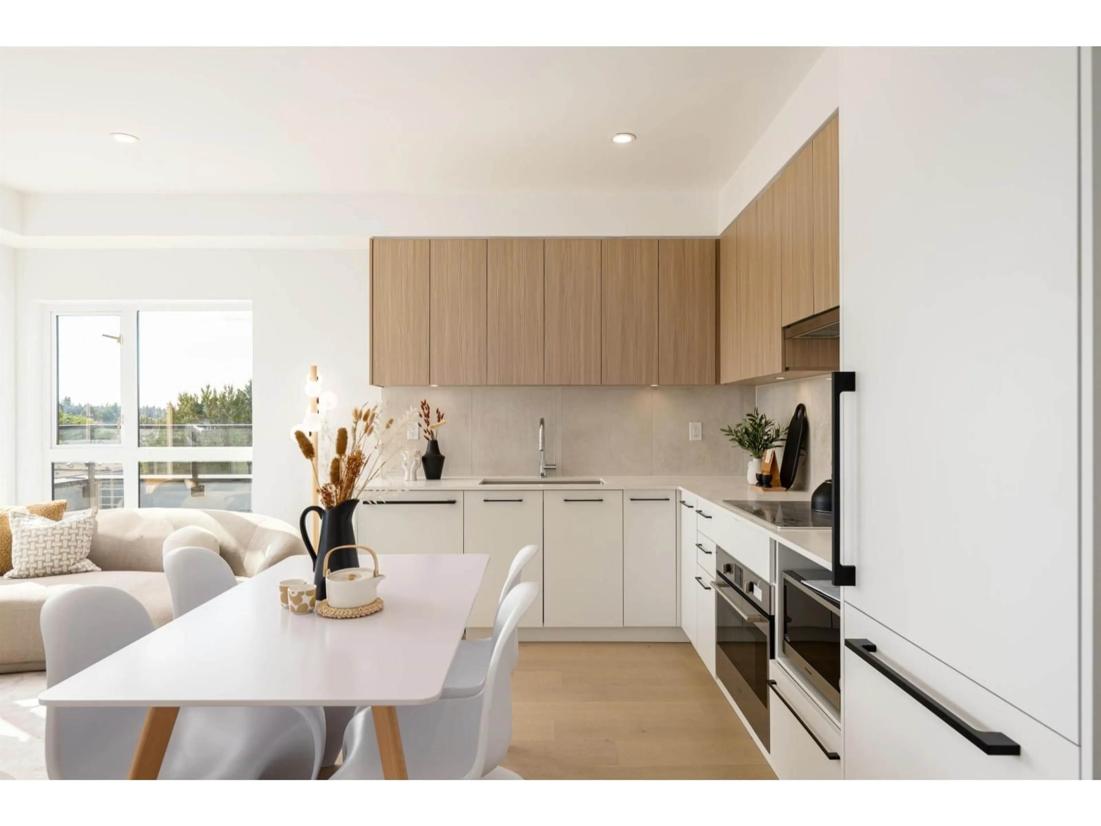 Open concept kitchen, wood/laminate floor for 502 - 5398 207 STREET, Langley British Columbia V3A2E6