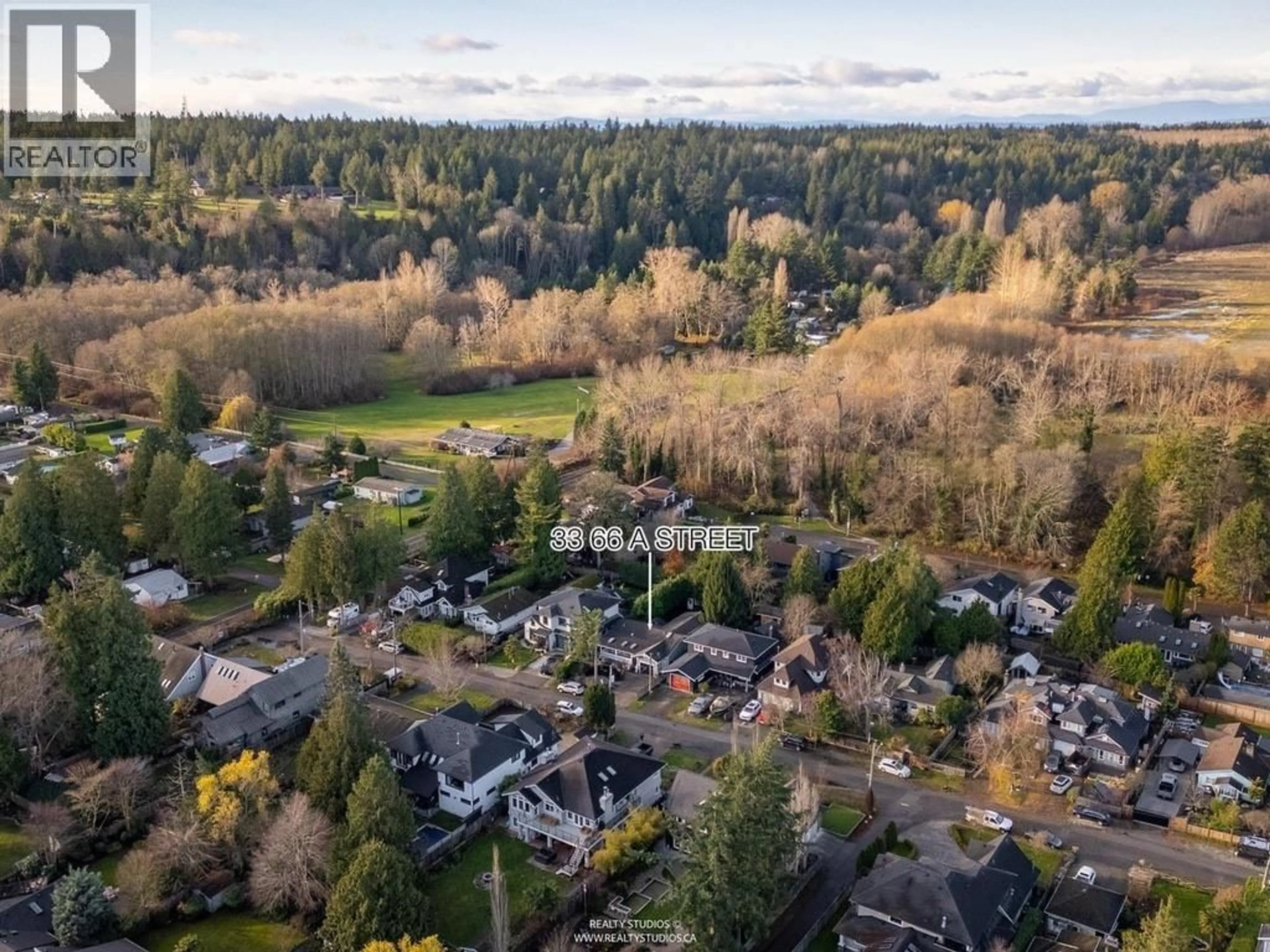 A pic from outside/outdoor area/front of a property/back of a property/a pic from drone, forest/trees view for 33 66A STREET, Delta British Columbia V4L1M3