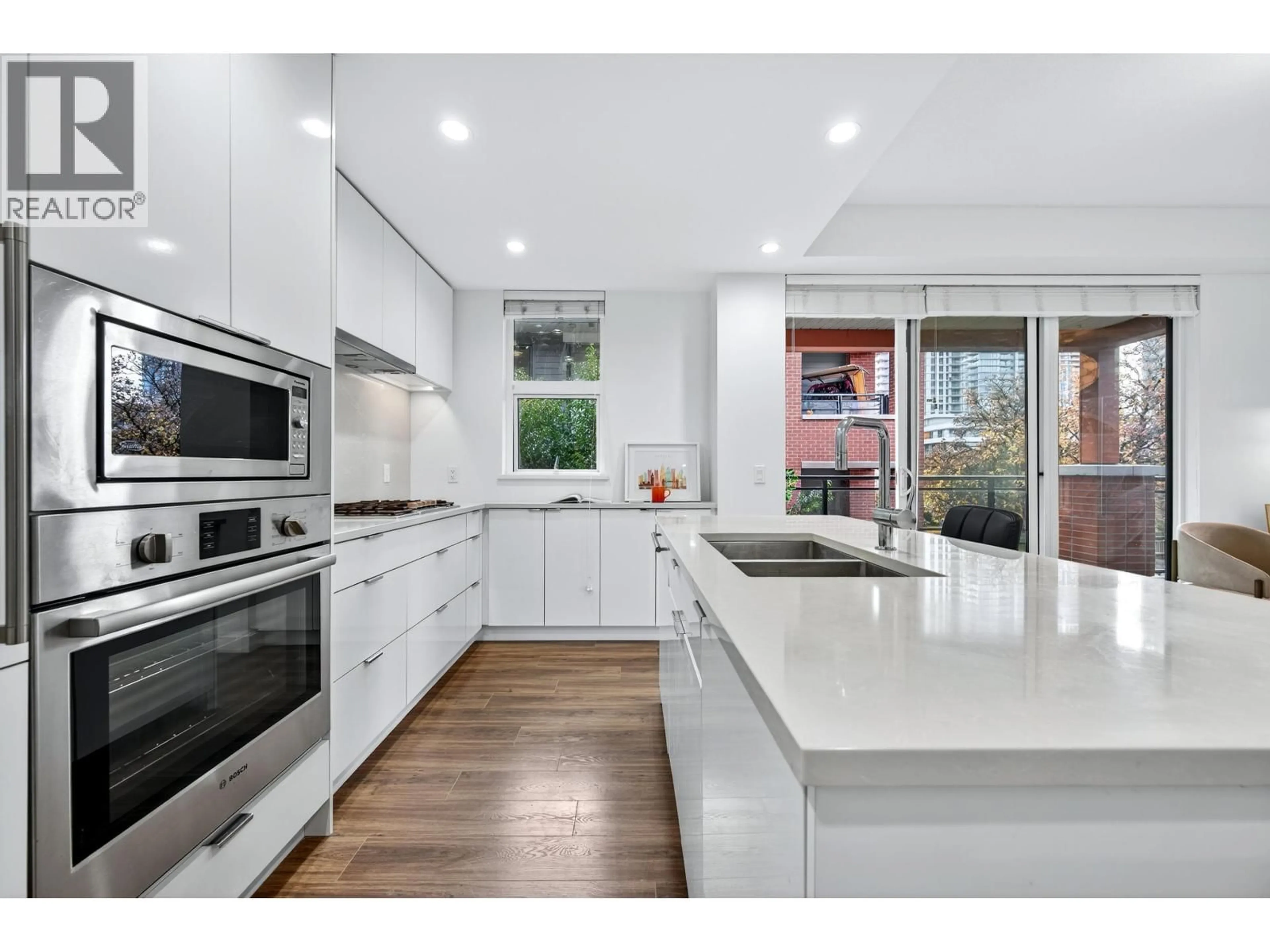 Contemporary kitchen, unknown for 205 - 7928 YUKON STREET, Vancouver British Columbia V5X2Y7