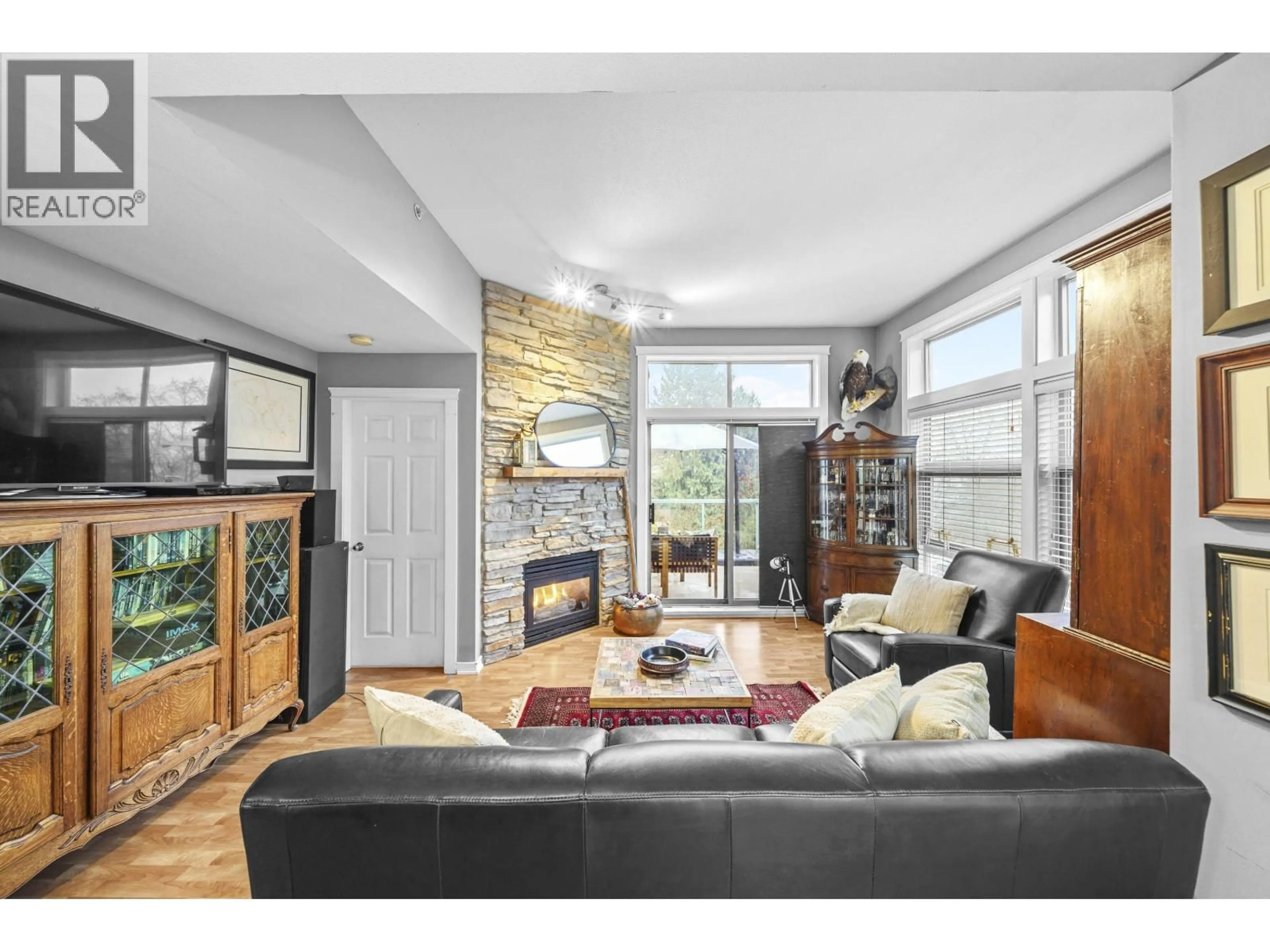 Living room with furniture, unknown for 408 - 301 MAUDE ROAD, Port Moody British Columbia V3H5B1