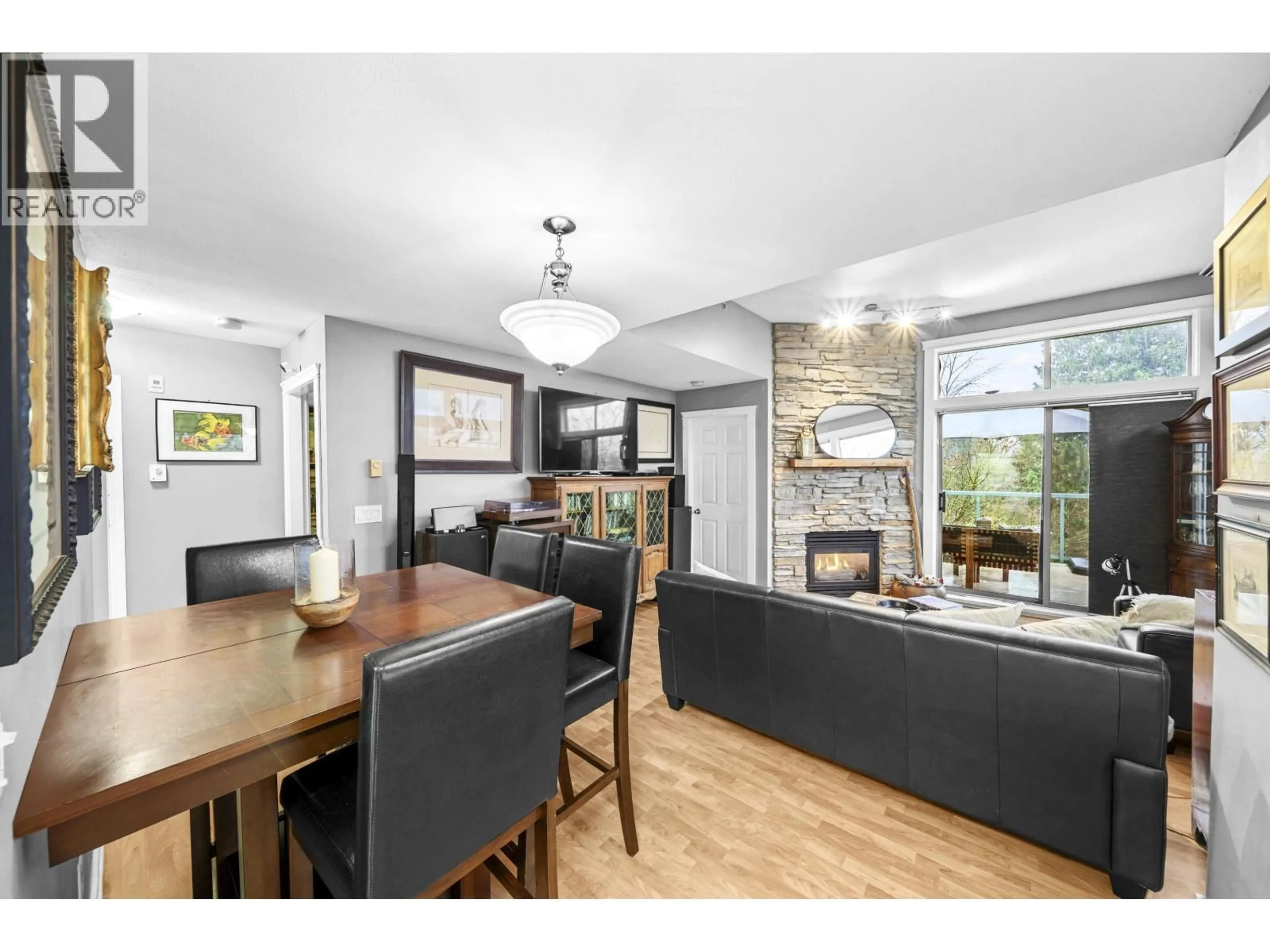 Open concept kitchen, wood/laminate floor for 408 - 301 MAUDE ROAD, Port Moody British Columbia V3H5B1