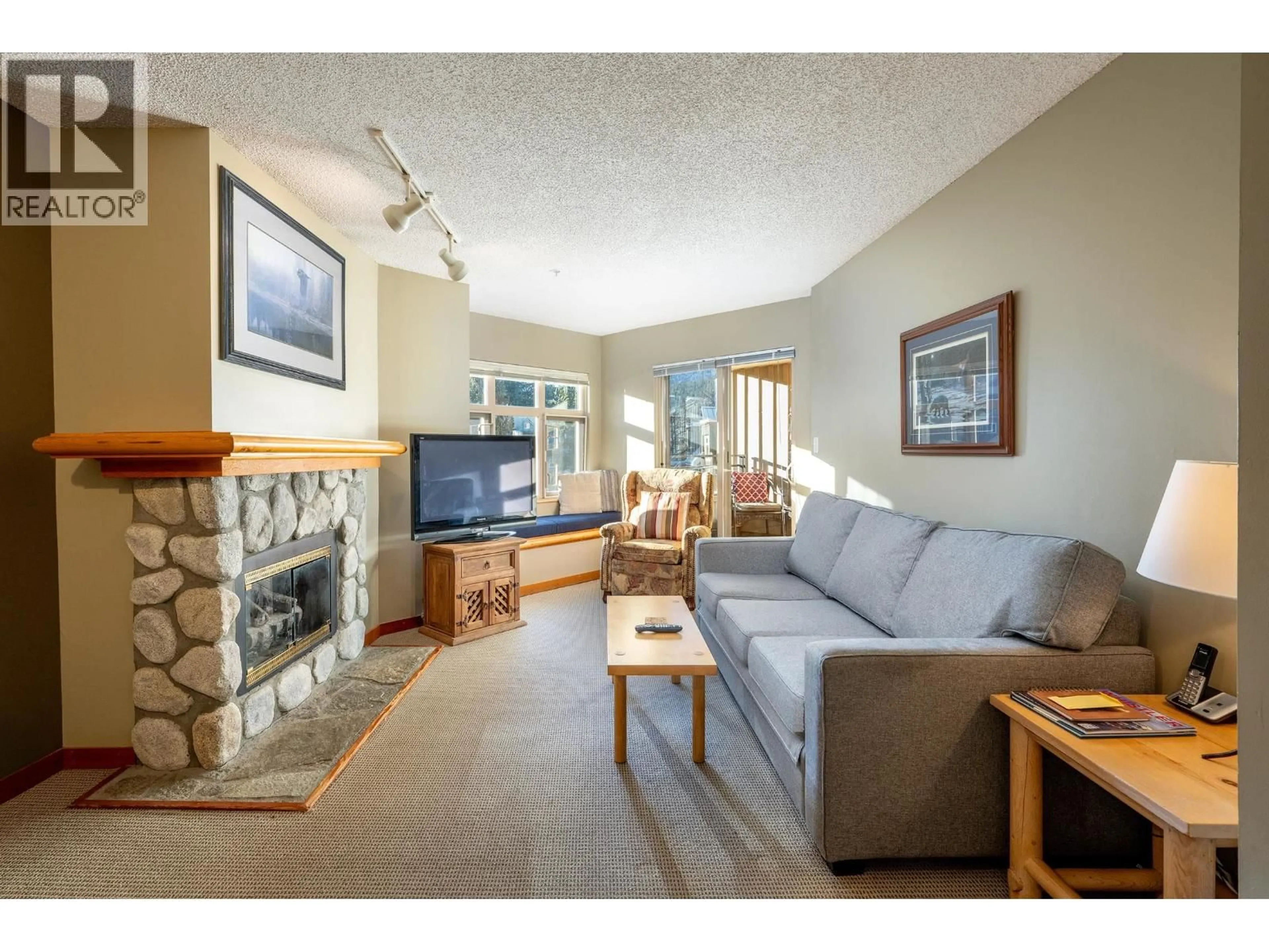 Living room with furniture, unknown for 322 - 2050 LAKE PLACID ROAD, Whistler British Columbia V8E0A8