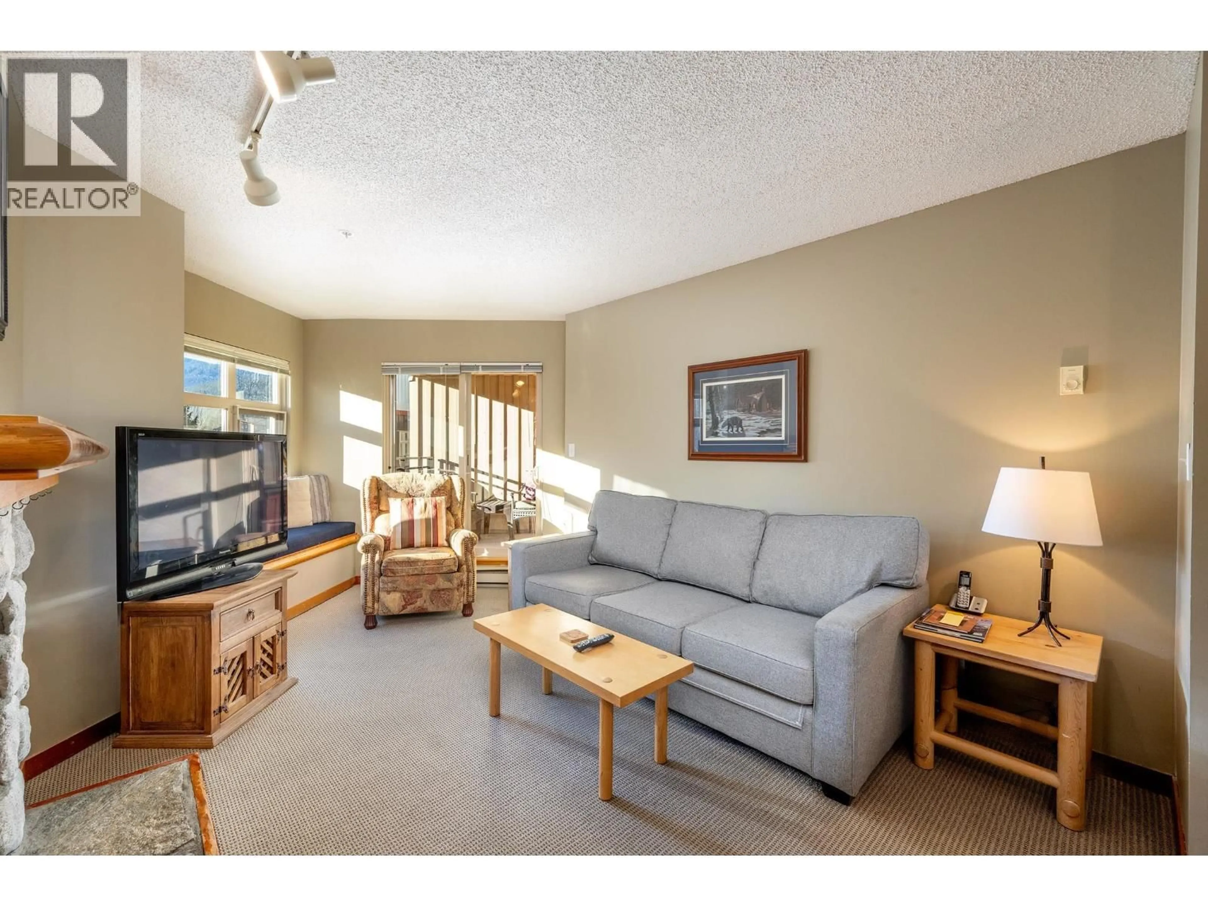 Living room with furniture, unknown for 322 - 2050 LAKE PLACID ROAD, Whistler British Columbia V8E0A8