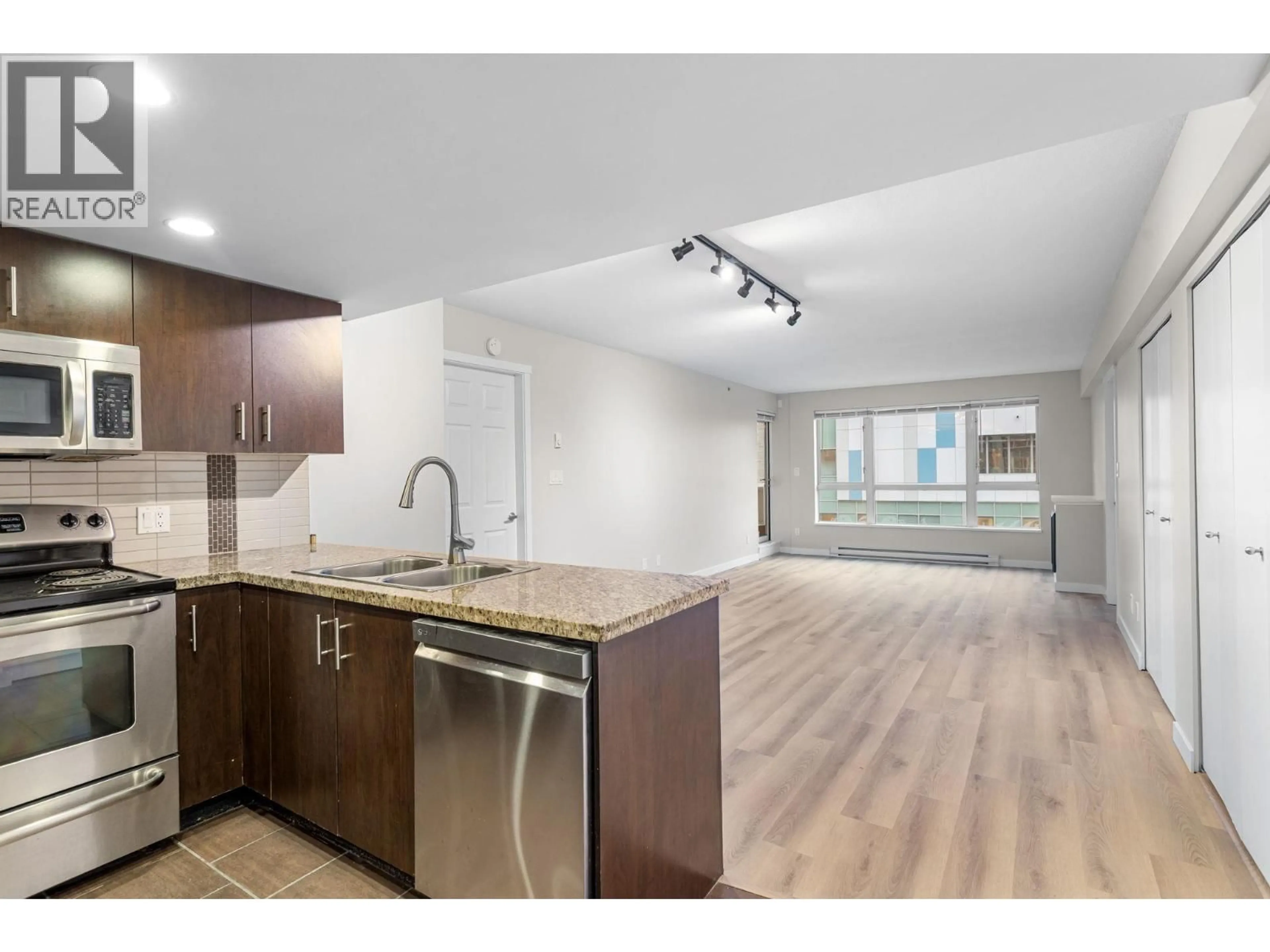 Open concept kitchen, unknown for 303 - 200 KEARY STREET, New Westminster British Columbia V3L0A6