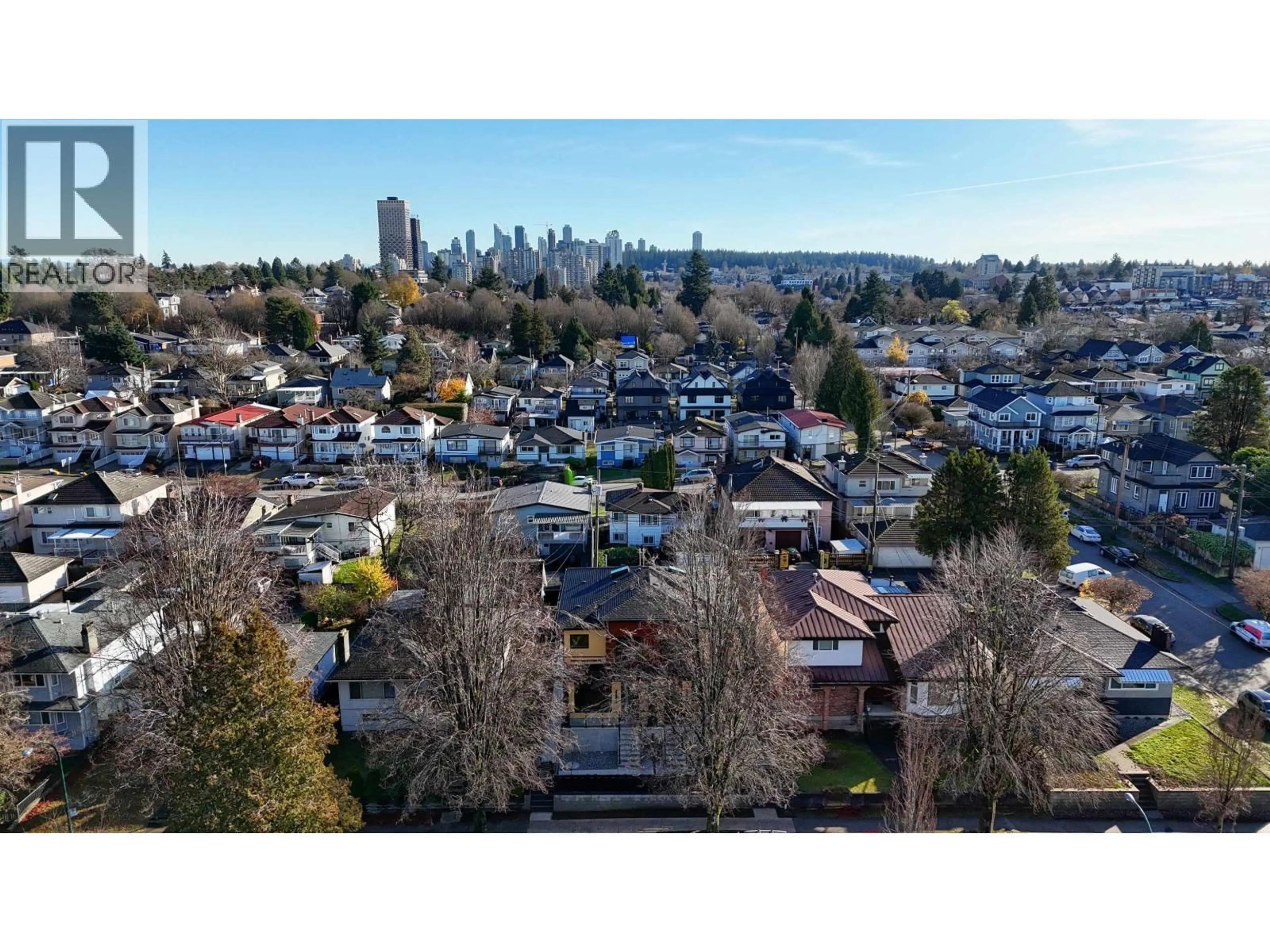 A pic from outside/outdoor area/front of a property/back of a property/a pic from drone, mountain view for 4670 TODD STREET, Vancouver British Columbia V5R3P8