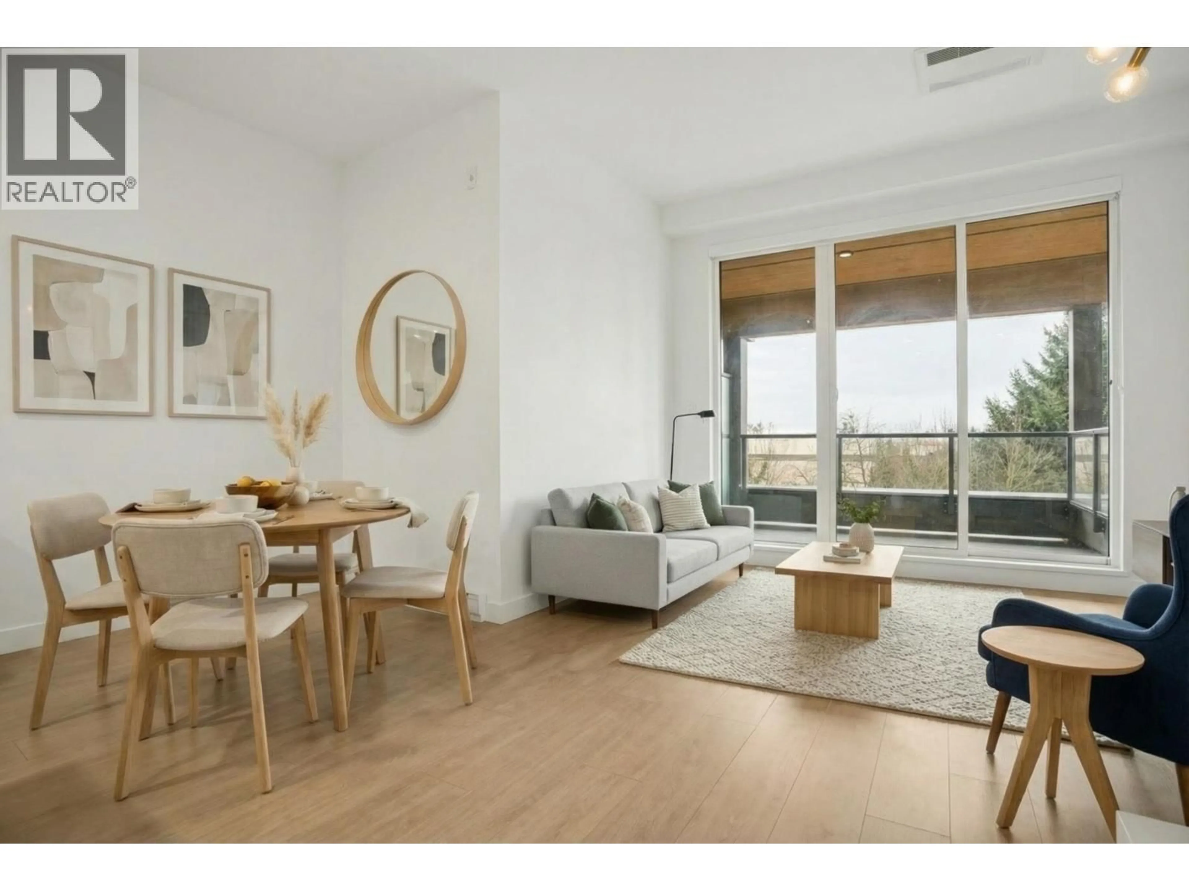 Living room with furniture, wood/laminate floor for 514 - 7588 16TH STREET, Burnaby British Columbia V3N0H8