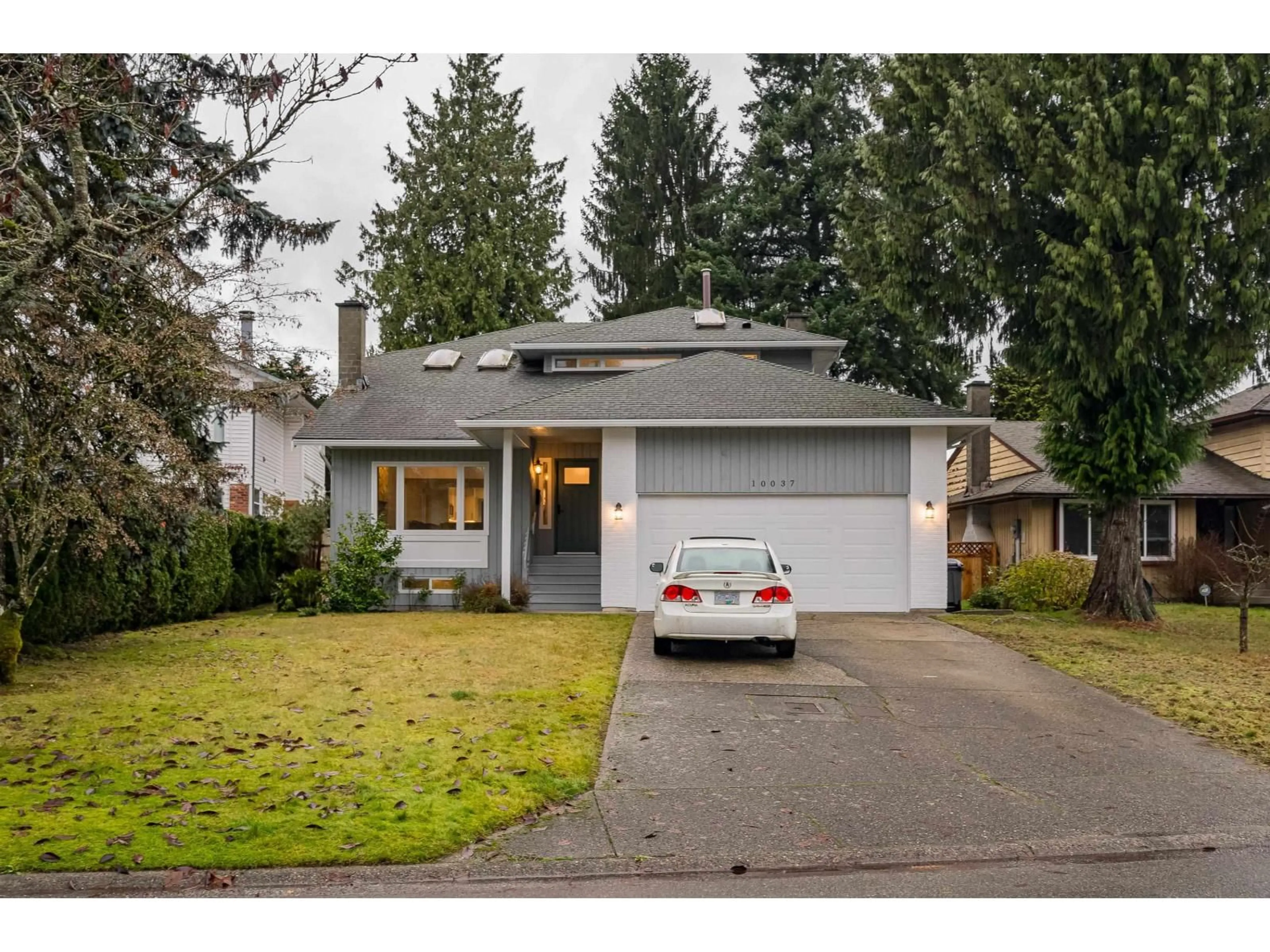 Home with vinyl exterior material, street for 10037 158A STREET, Surrey British Columbia V4N2P9