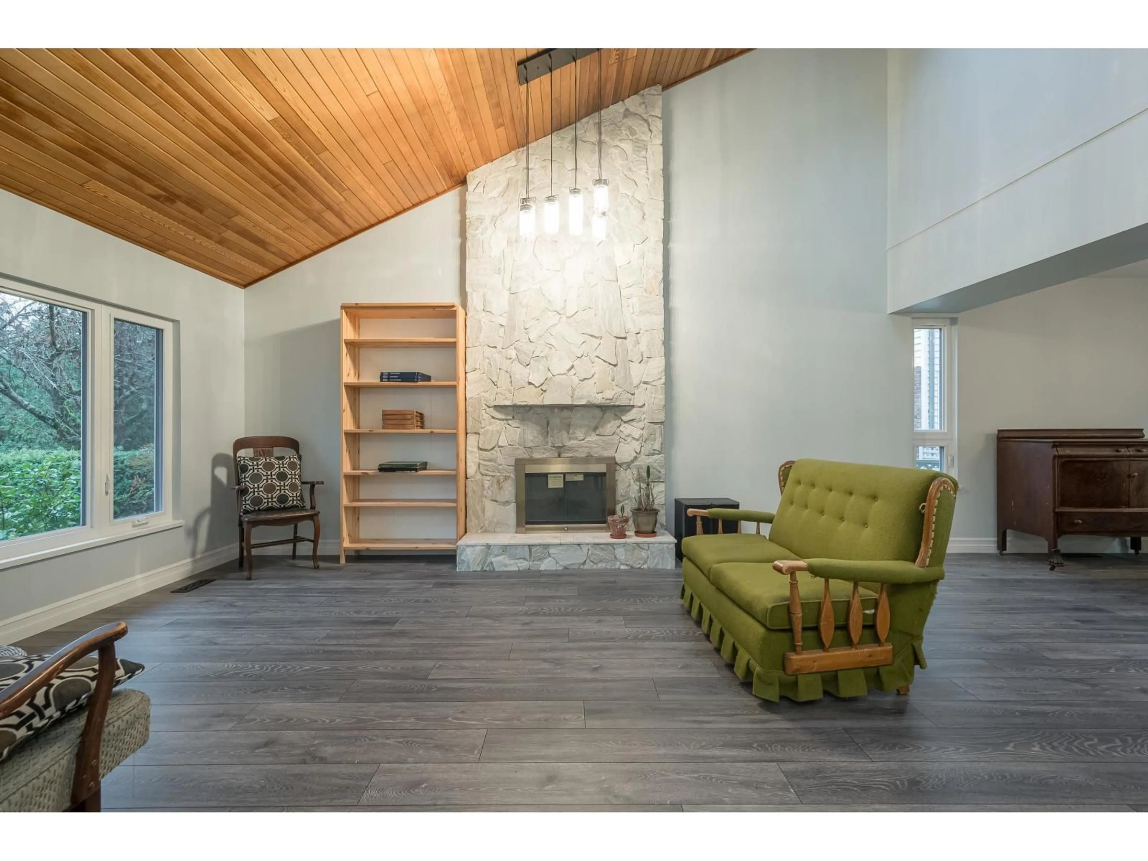 Living room with furniture, wood/laminate floor for 10037 158A STREET, Surrey British Columbia V4N2P9