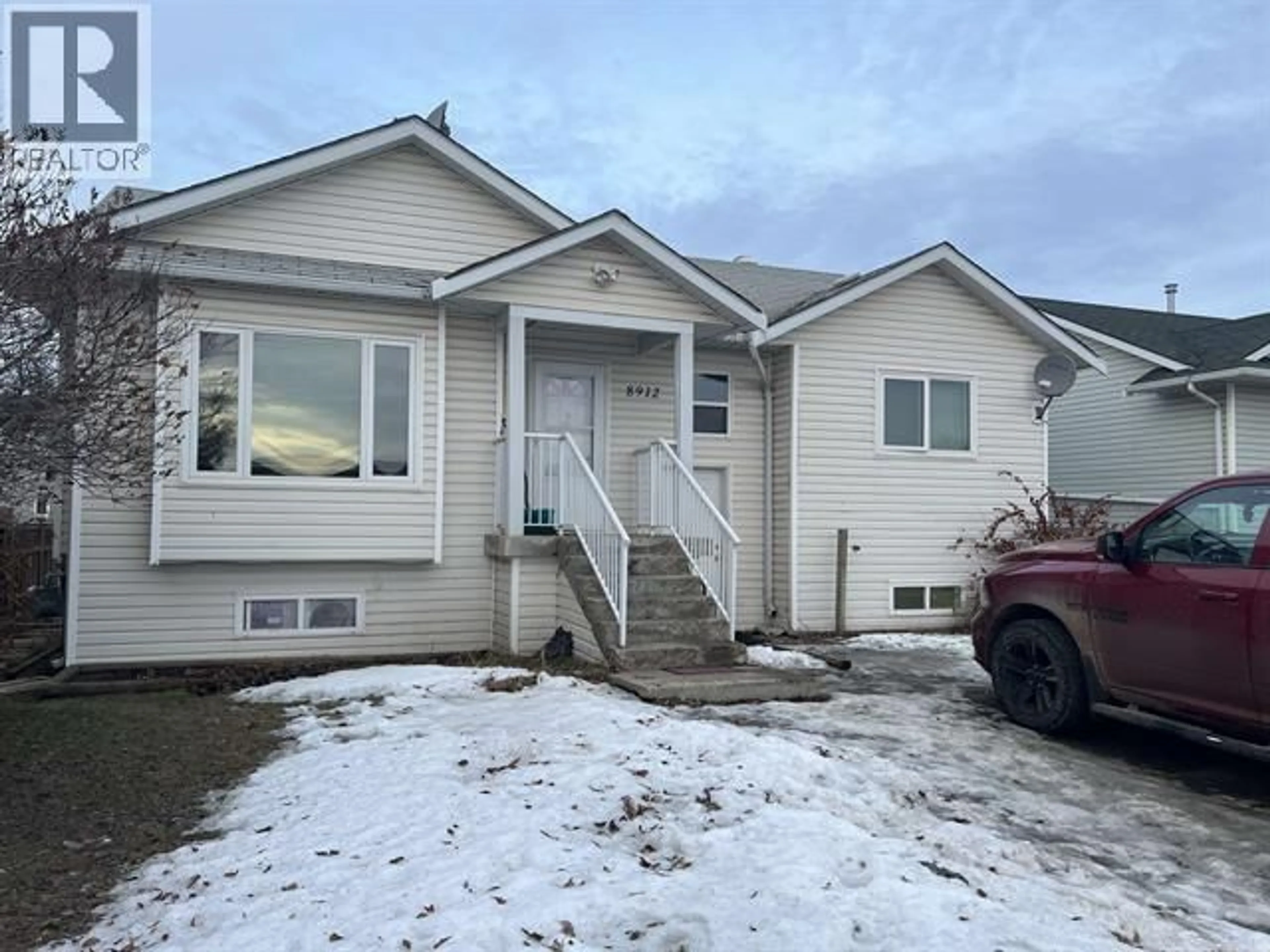 Home with vinyl exterior material, street for 8912 81 STREET, Fort St. John British Columbia V1J6T7