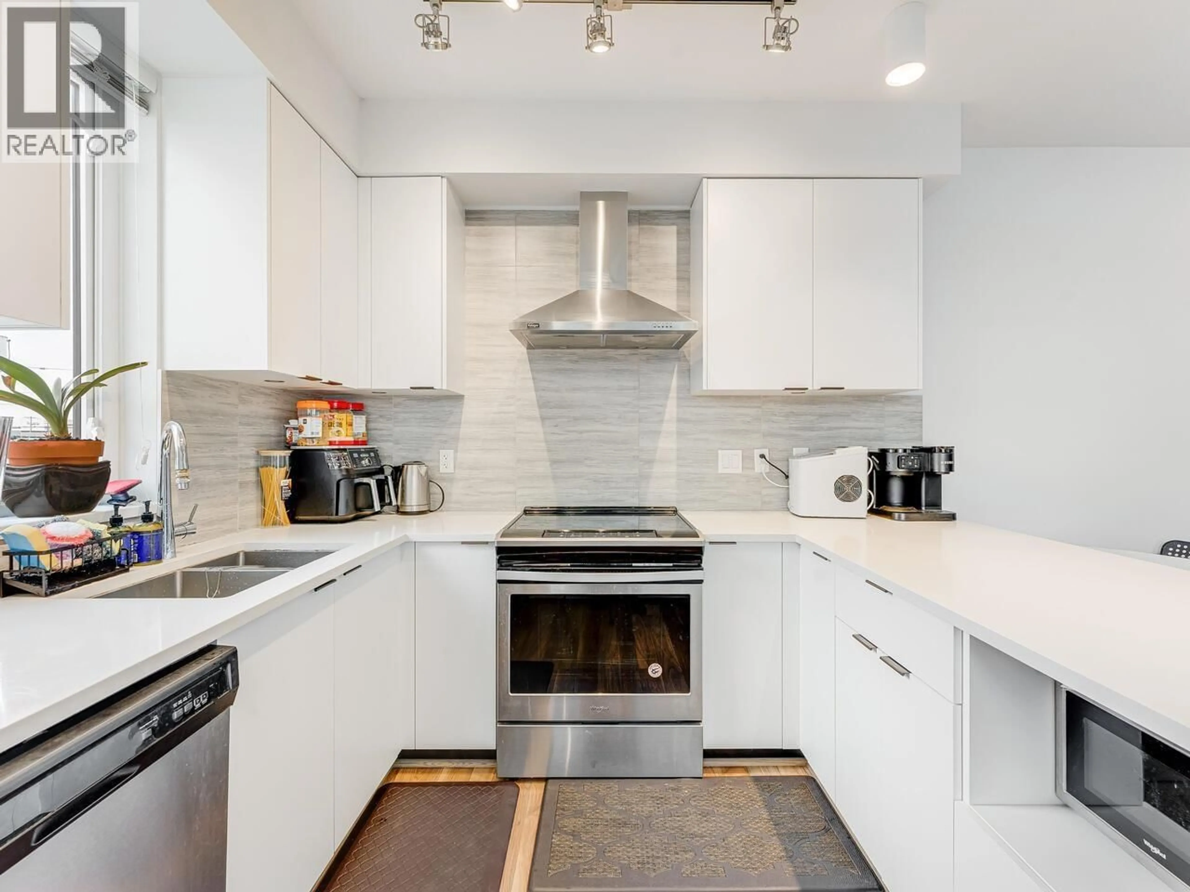 Contemporary kitchen, ceramic/tile floor for 212 - 5355 LANE STREET, Burnaby British Columbia V5H0H1