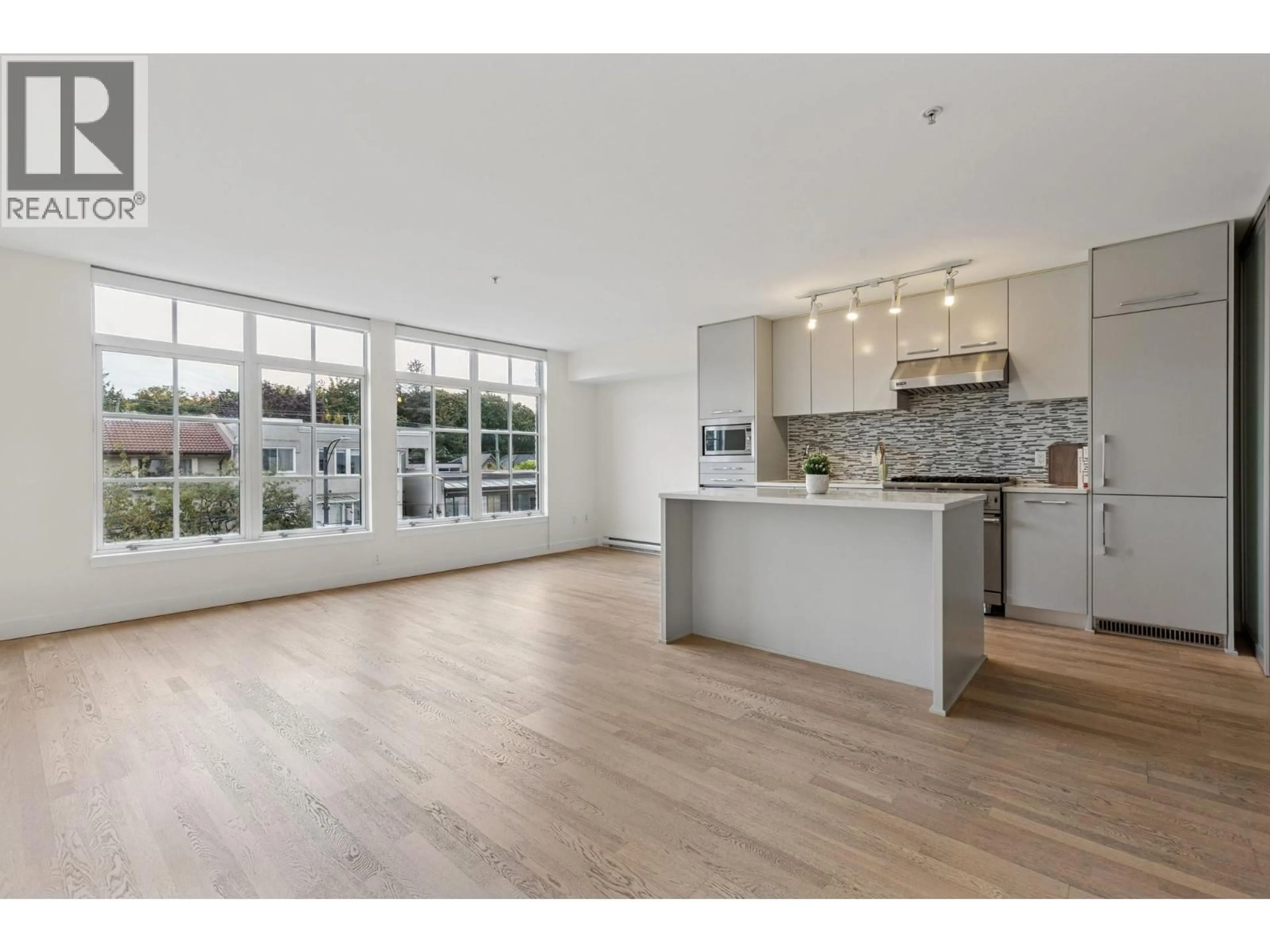 Open concept kitchen, unknown for 306 - 4355 10TH AVENUE, Vancouver British Columbia V6R2H6