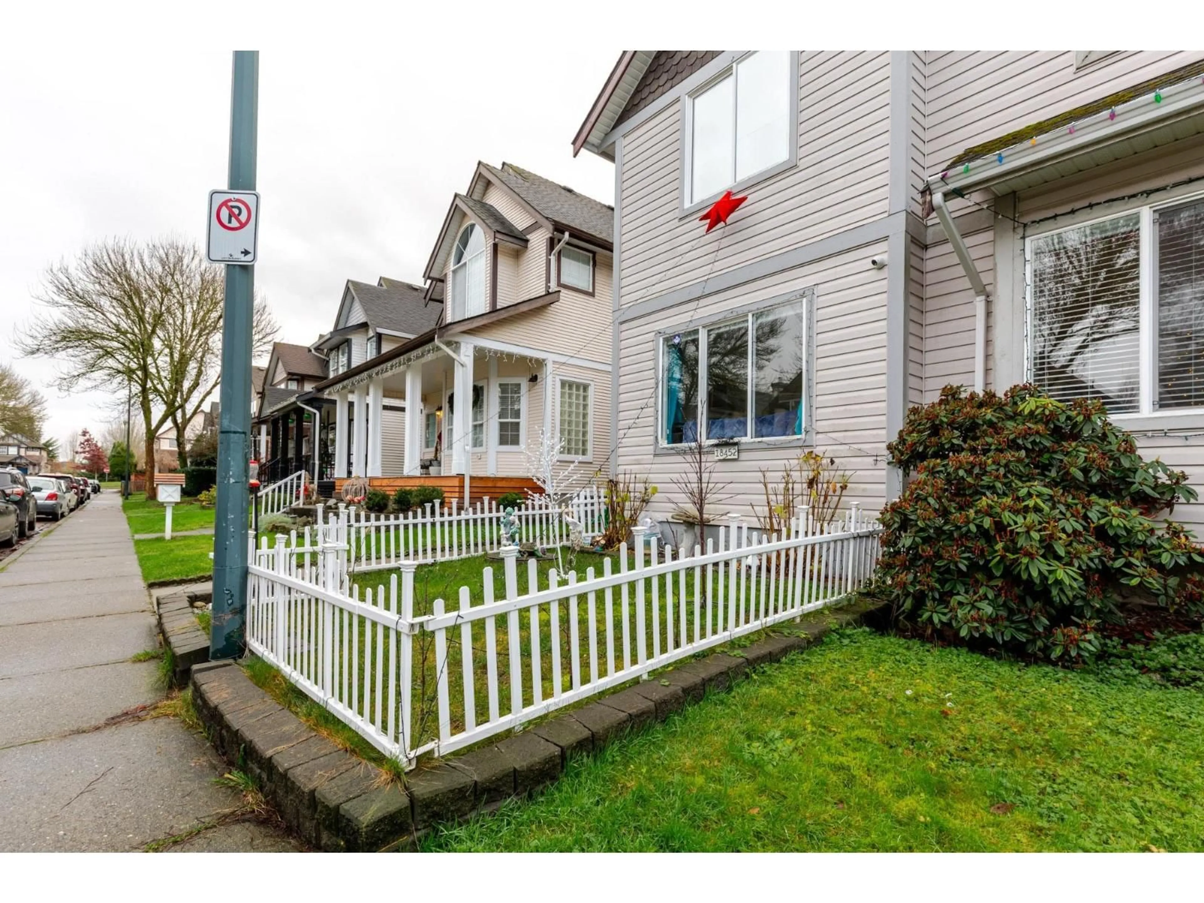 Home with vinyl exterior material, street for 18452 66 AVENUE, Surrey British Columbia V3S8V6