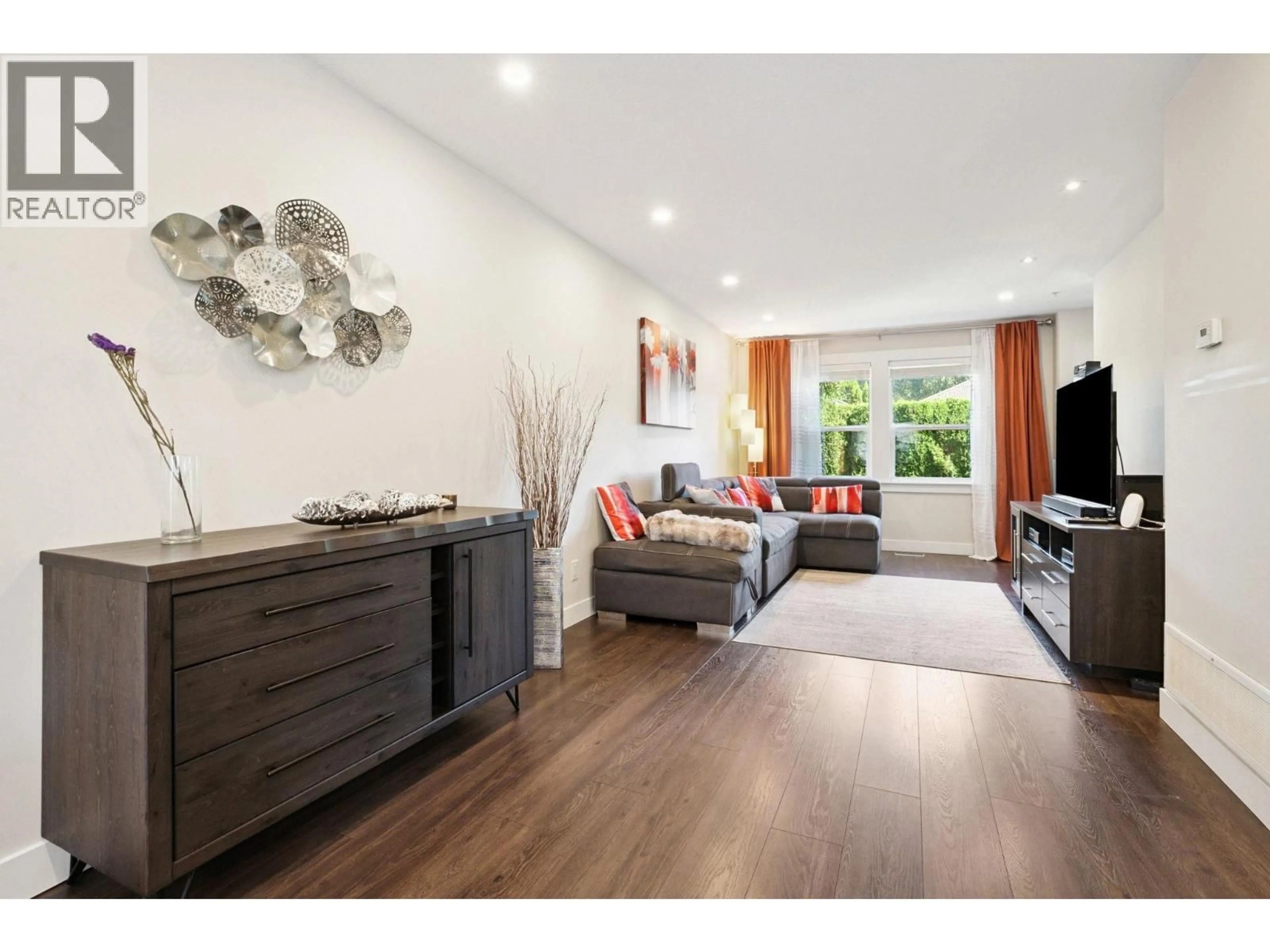 Living room with furniture, wood/laminate floor for 34 - 1260 RIVERSIDE DRIVE, Port Coquitlam British Columbia V3B8C7