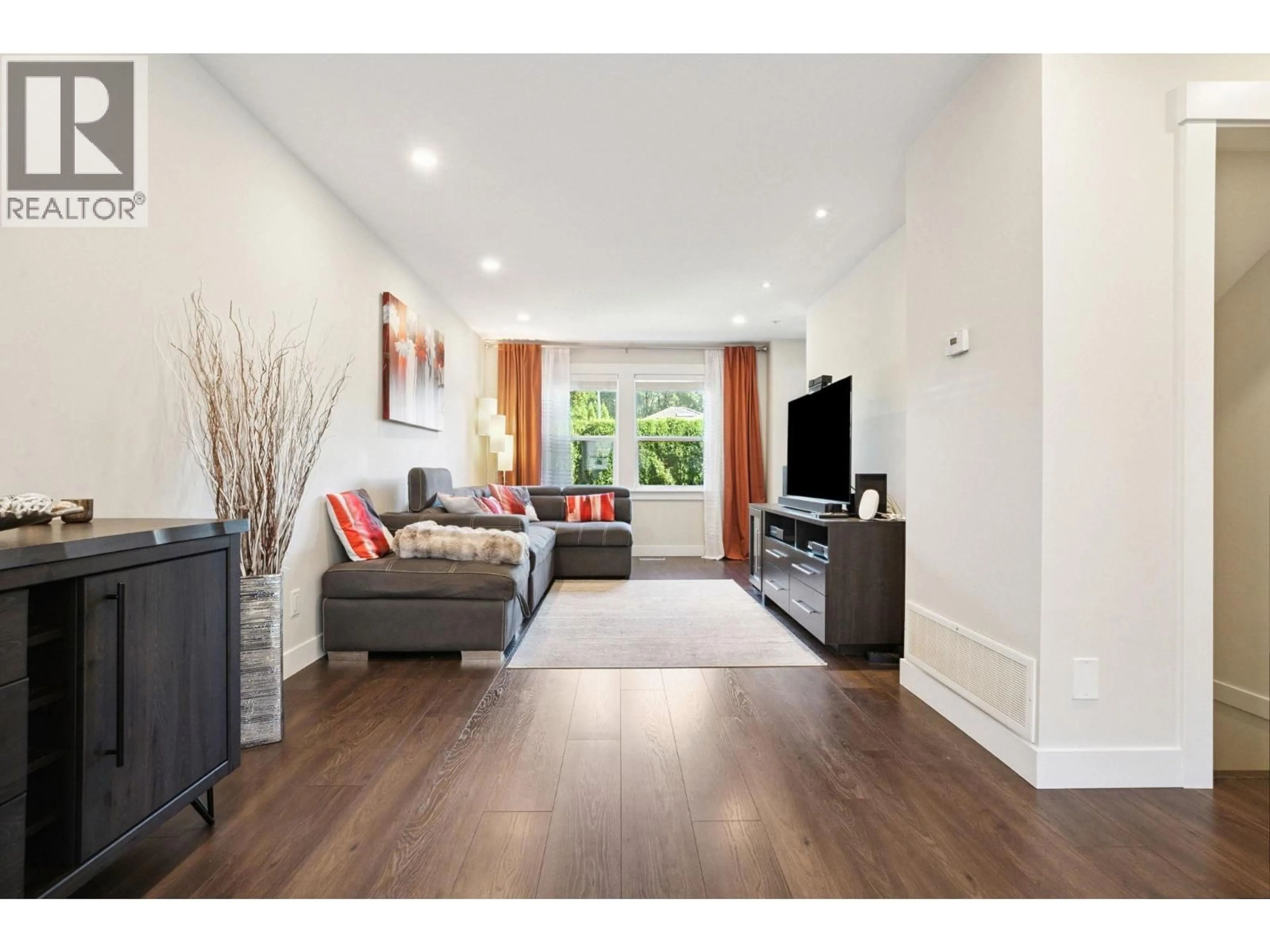 Living room with furniture, wood/laminate floor for 34 - 1260 RIVERSIDE DRIVE, Port Coquitlam British Columbia V3B8C7