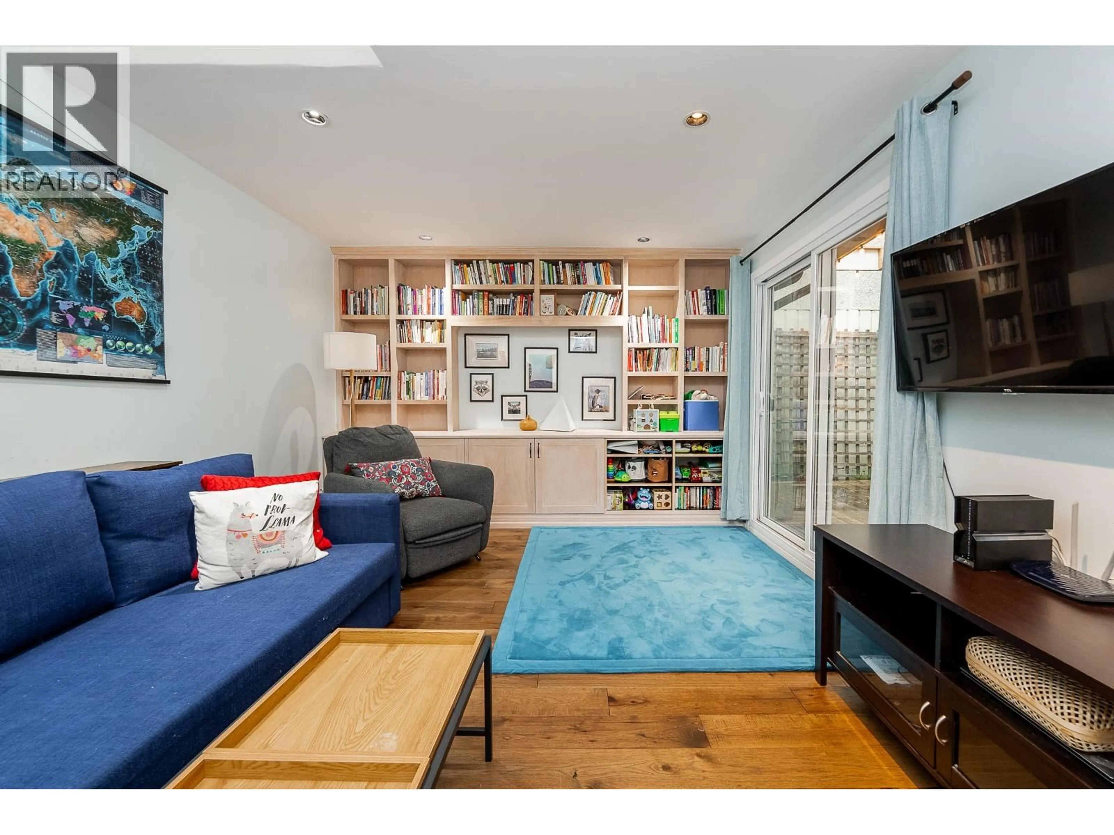 Living room with furniture, wood/laminate floor for 3005 FIRBROOK PLACE, Coquitlam British Columbia V3C4B2
