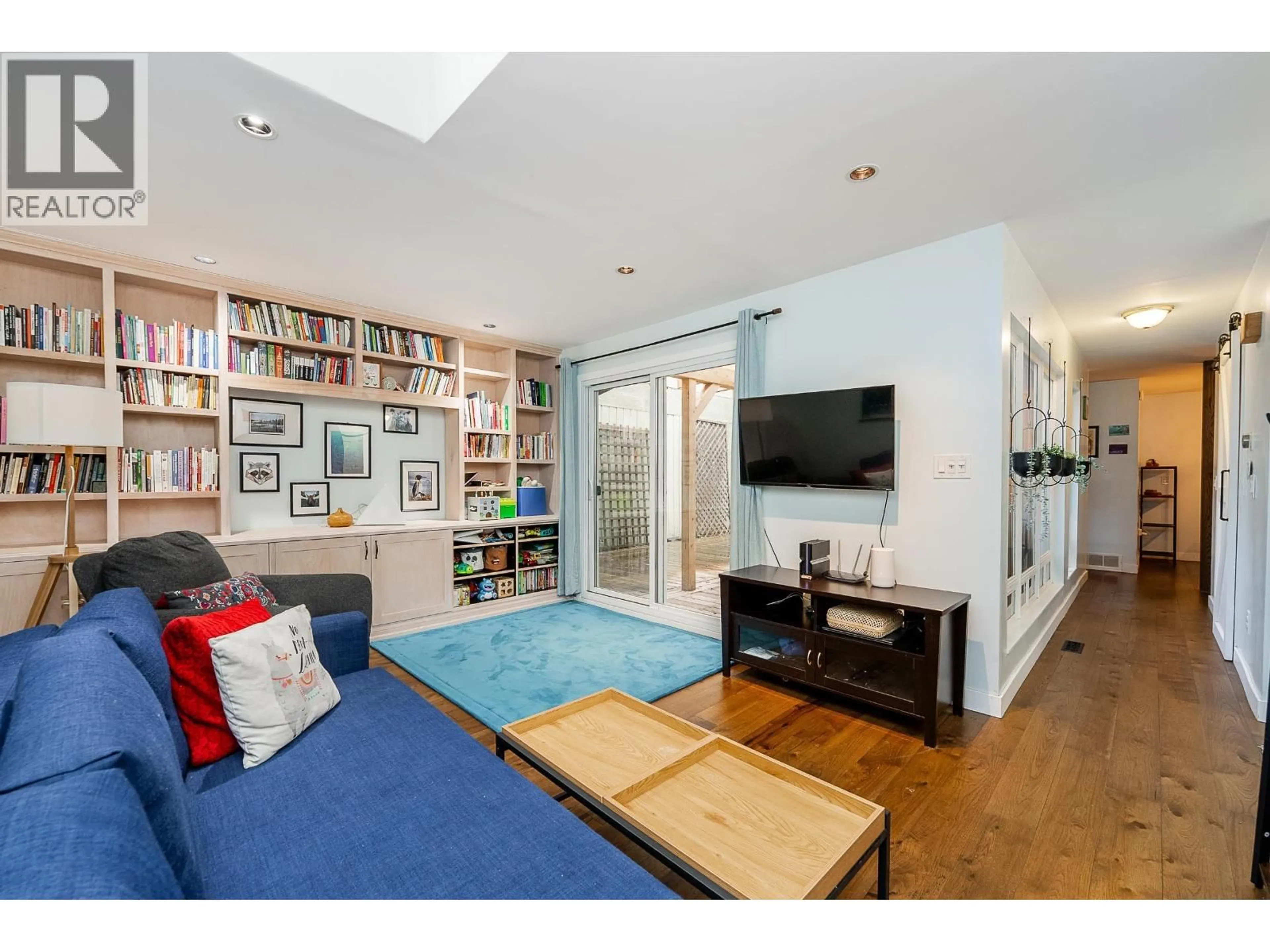 Living room with furniture, wood/laminate floor for 3005 FIRBROOK PLACE, Coquitlam British Columbia V3C4B2