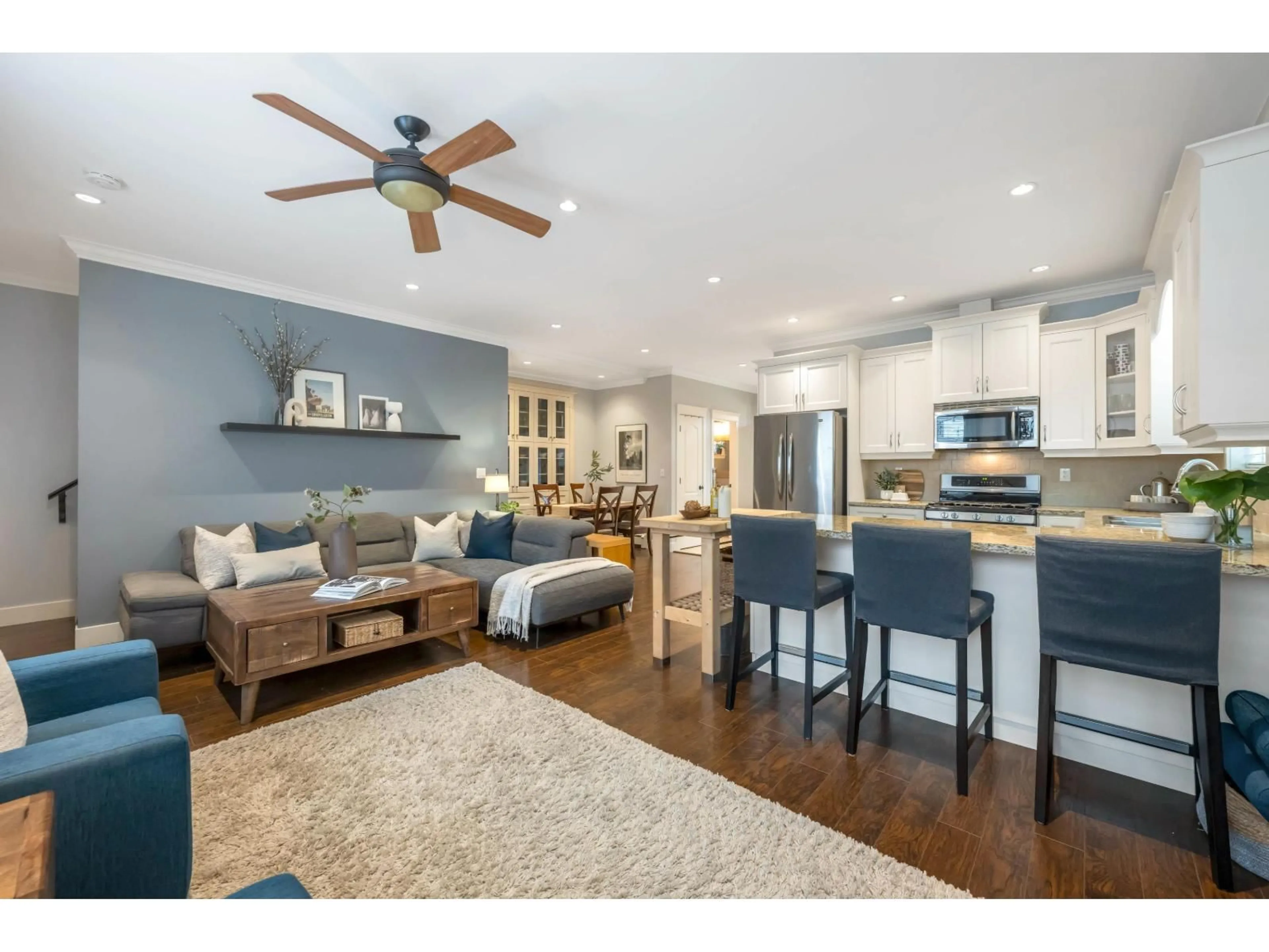 Open concept kitchen, wood/laminate floor for 7137 196 STREET, Surrey British Columbia V4N5Z6