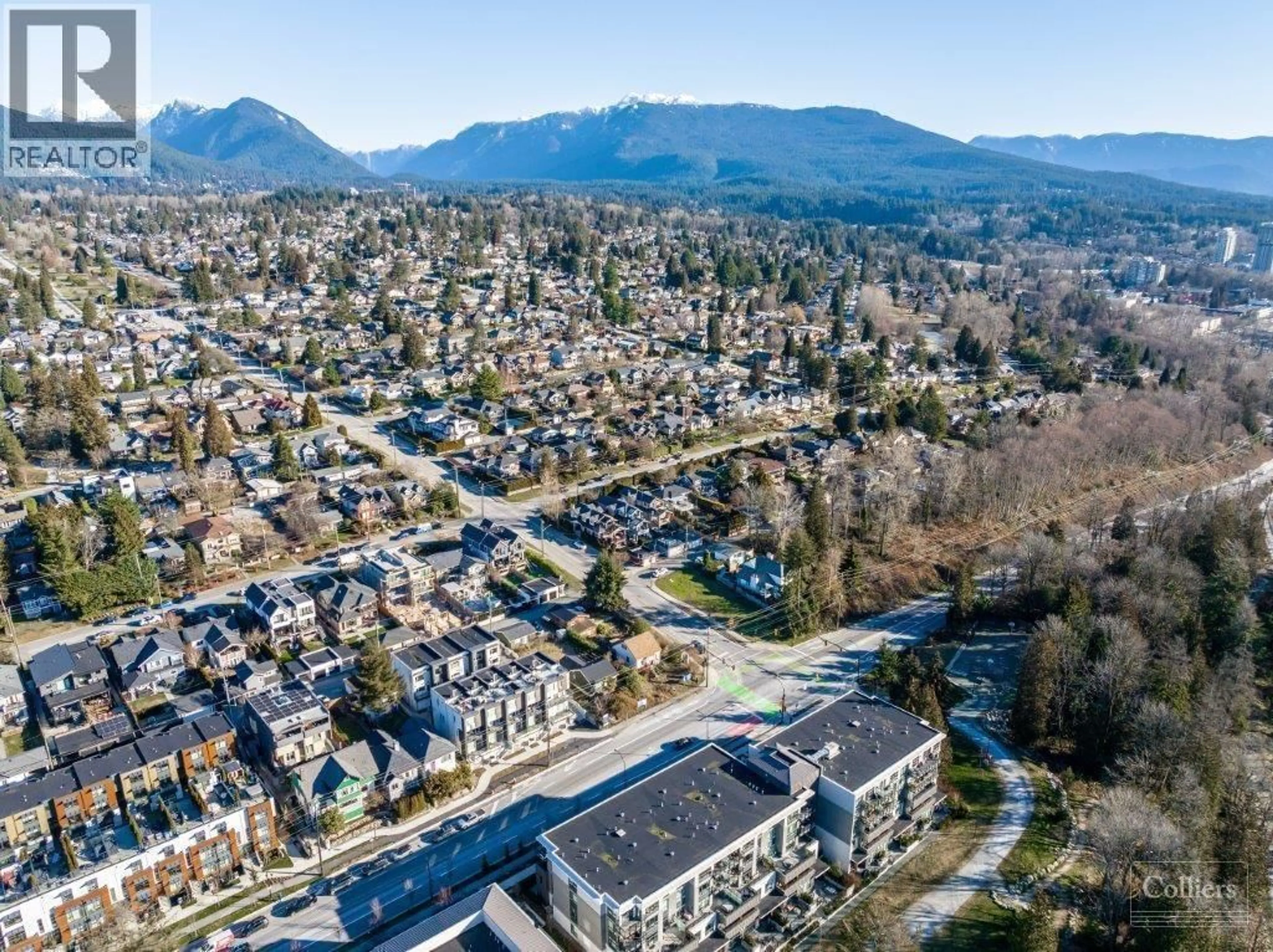 A pic from outside/outdoor area/front of a property/back of a property/a pic from drone, mountain view for 808 3RD STREET, North Vancouver British Columbia V7L1H1