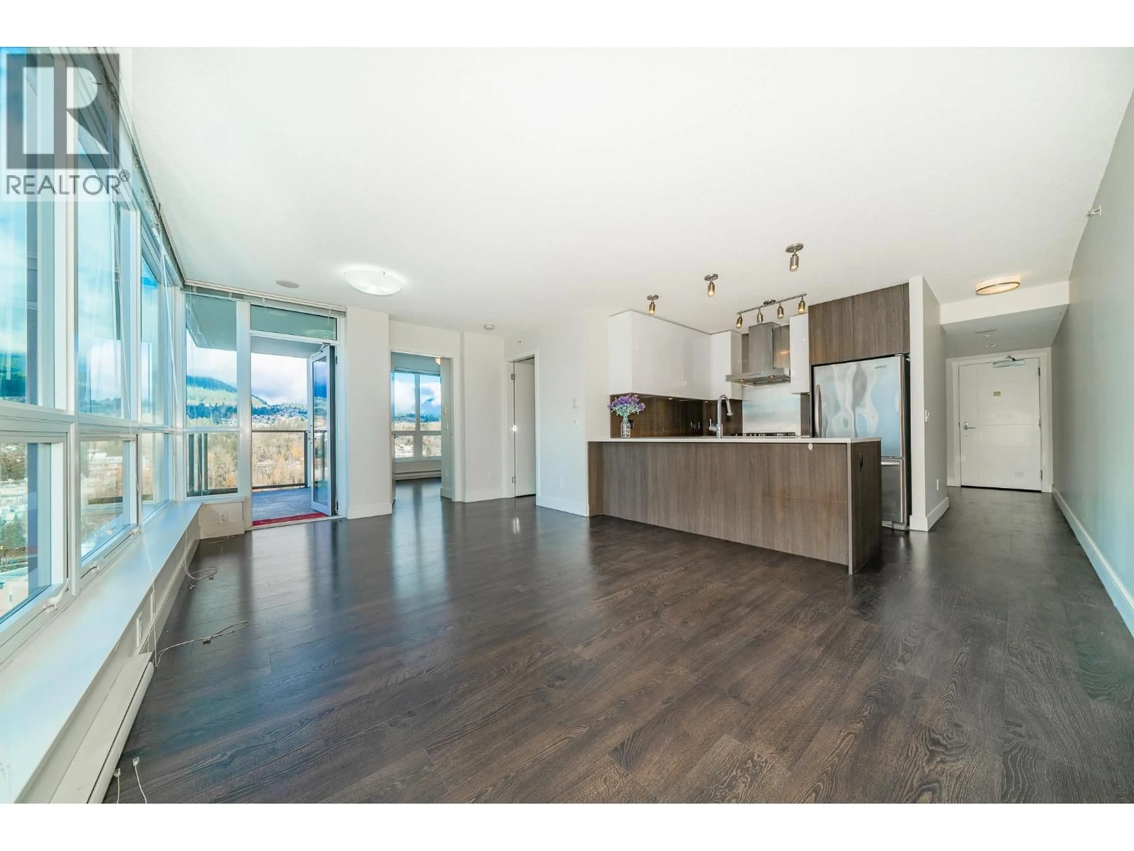 Open concept kitchen, wood/laminate floor for 1809 - 3007 GLEN DRIVE, Coquitlam British Columbia V3B0L8