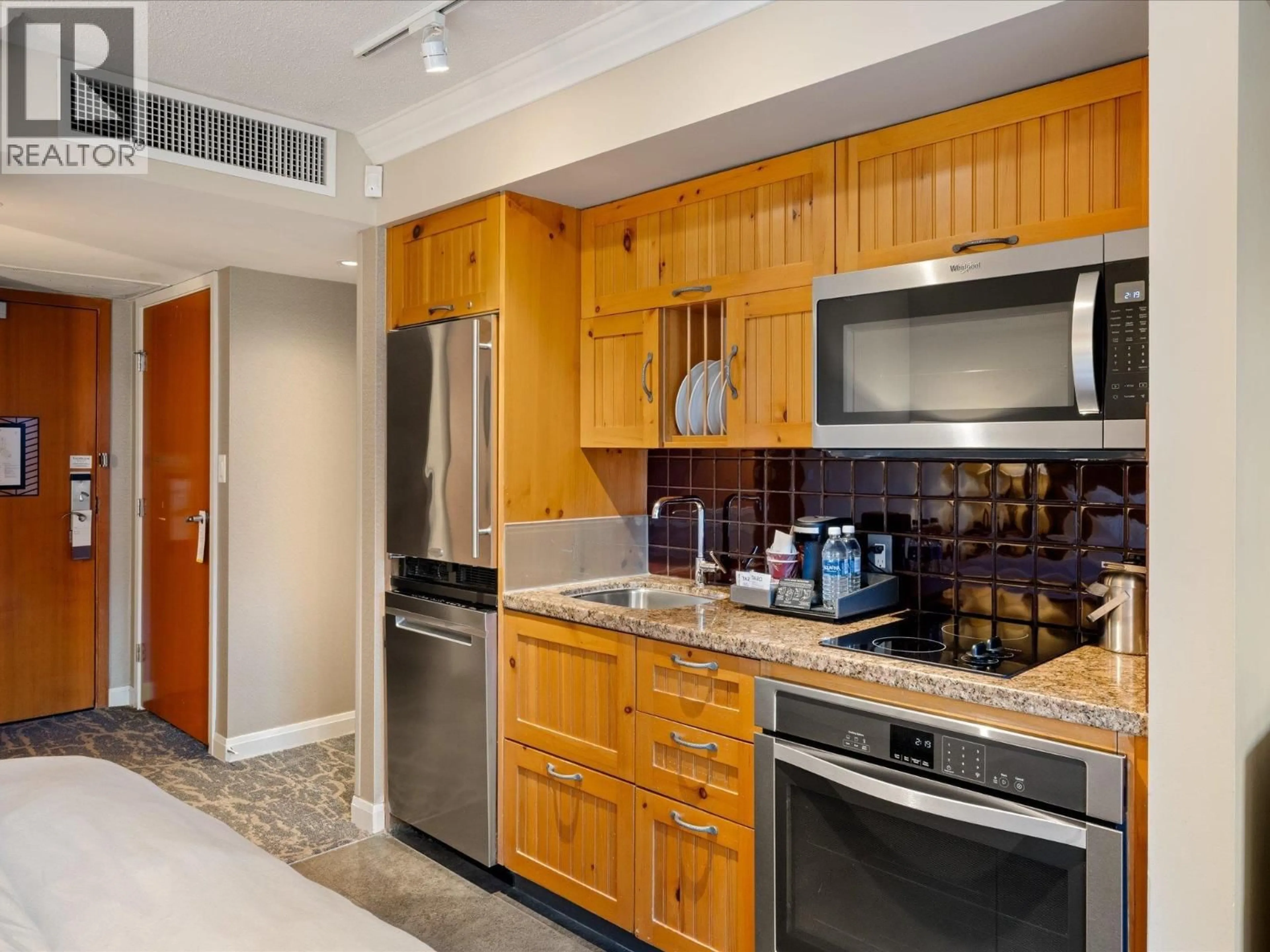 Contemporary kitchen, ceramic/tile floor for 855 - 4090 WHISTLER WAY, Whistler British Columbia V8E1J3