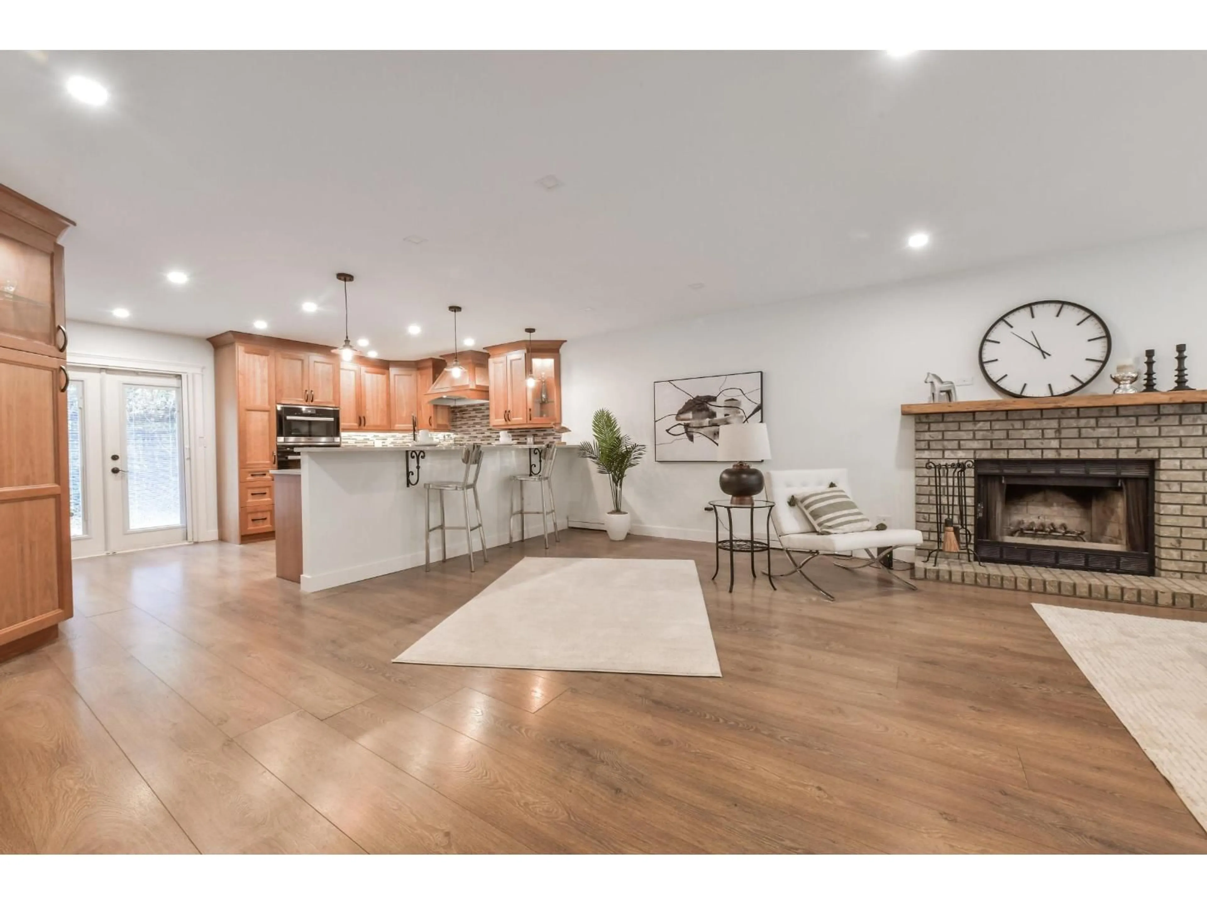 Open concept kitchen, wood/laminate floor for 6035 172B STREET, Surrey British Columbia V3S6G6