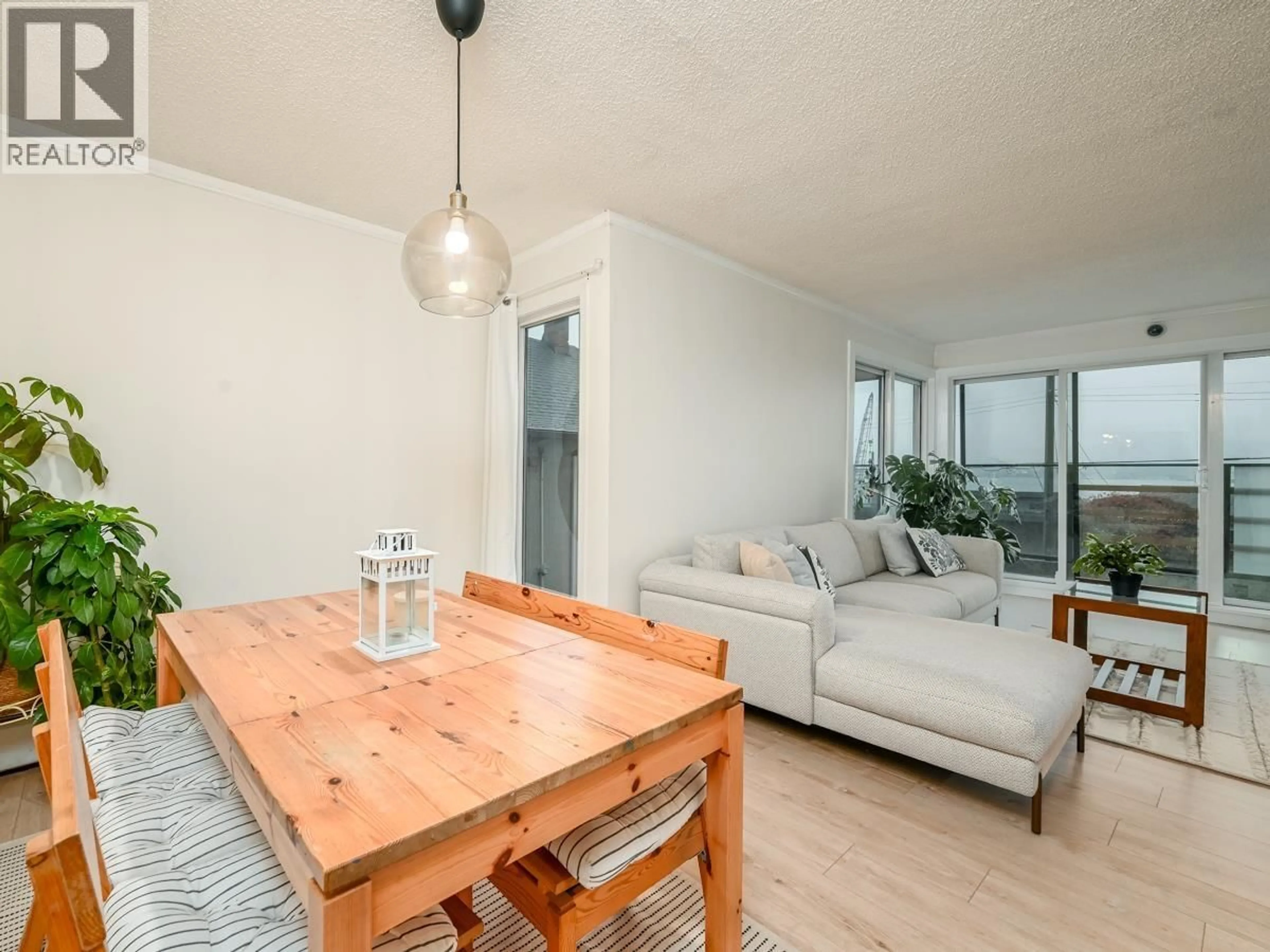 Living room with furniture, wood/laminate floor for 201 - 2336 WALL STREET, Vancouver British Columbia V5L1B7