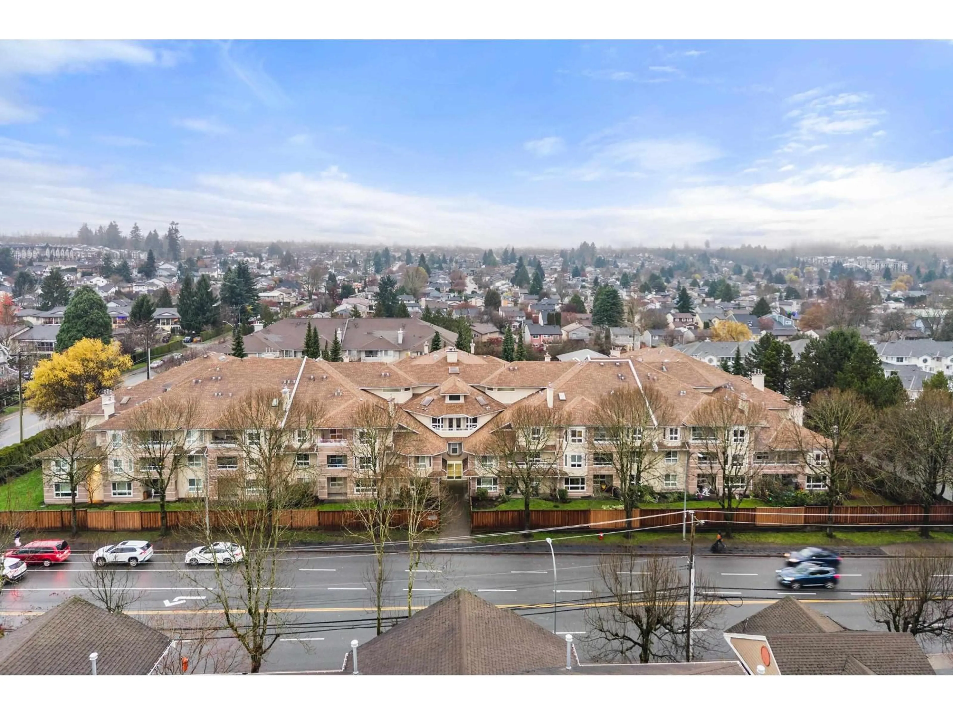 A pic from outside/outdoor area/front of a property/back of a property/a pic from drone, mountain view for 402 - 19721 64 AVENUE, Langley British Columbia V2Y1L1