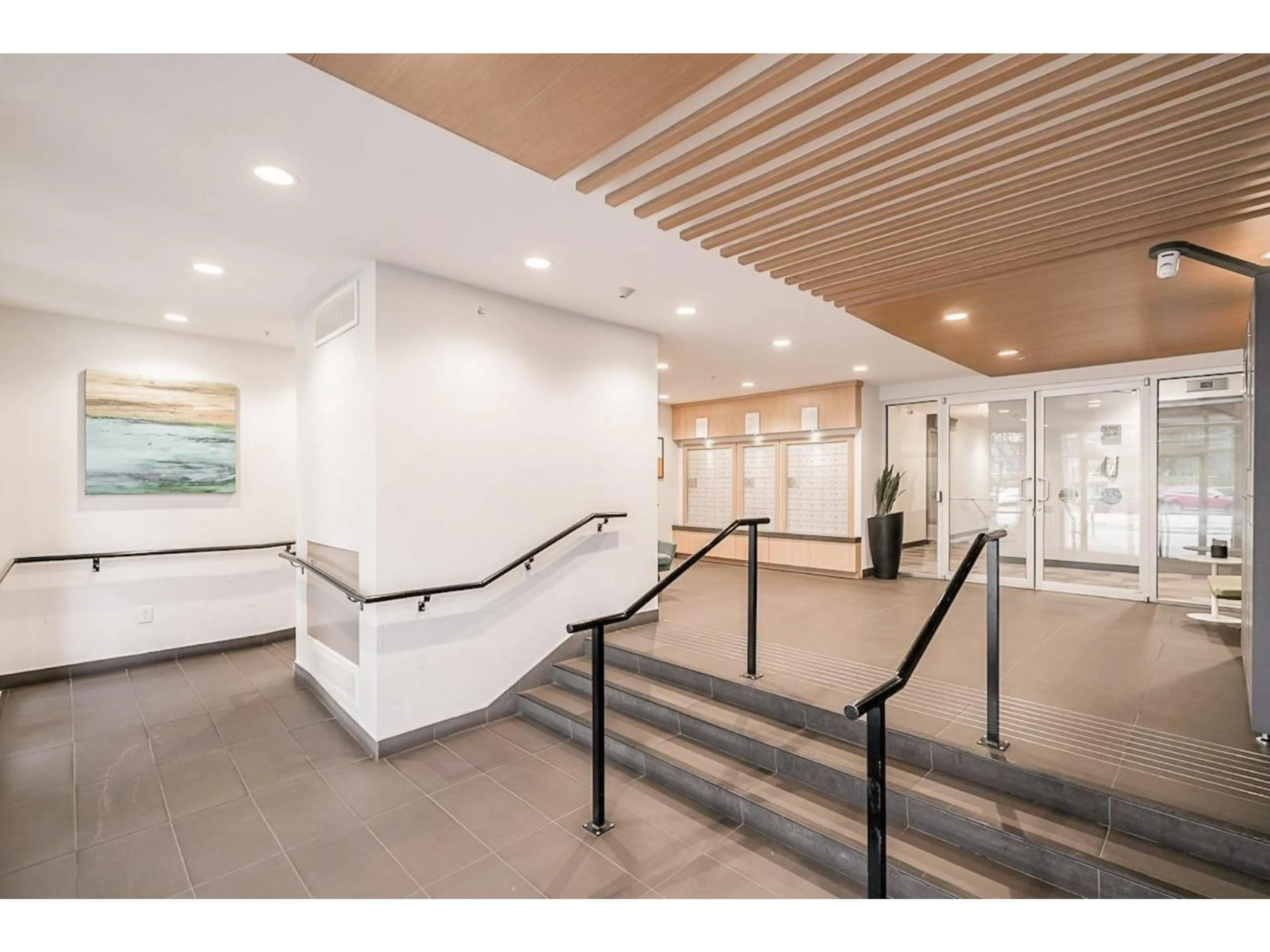 Indoor foyer for 205 - 10581 140 STREET, Surrey British Columbia V3T0M7